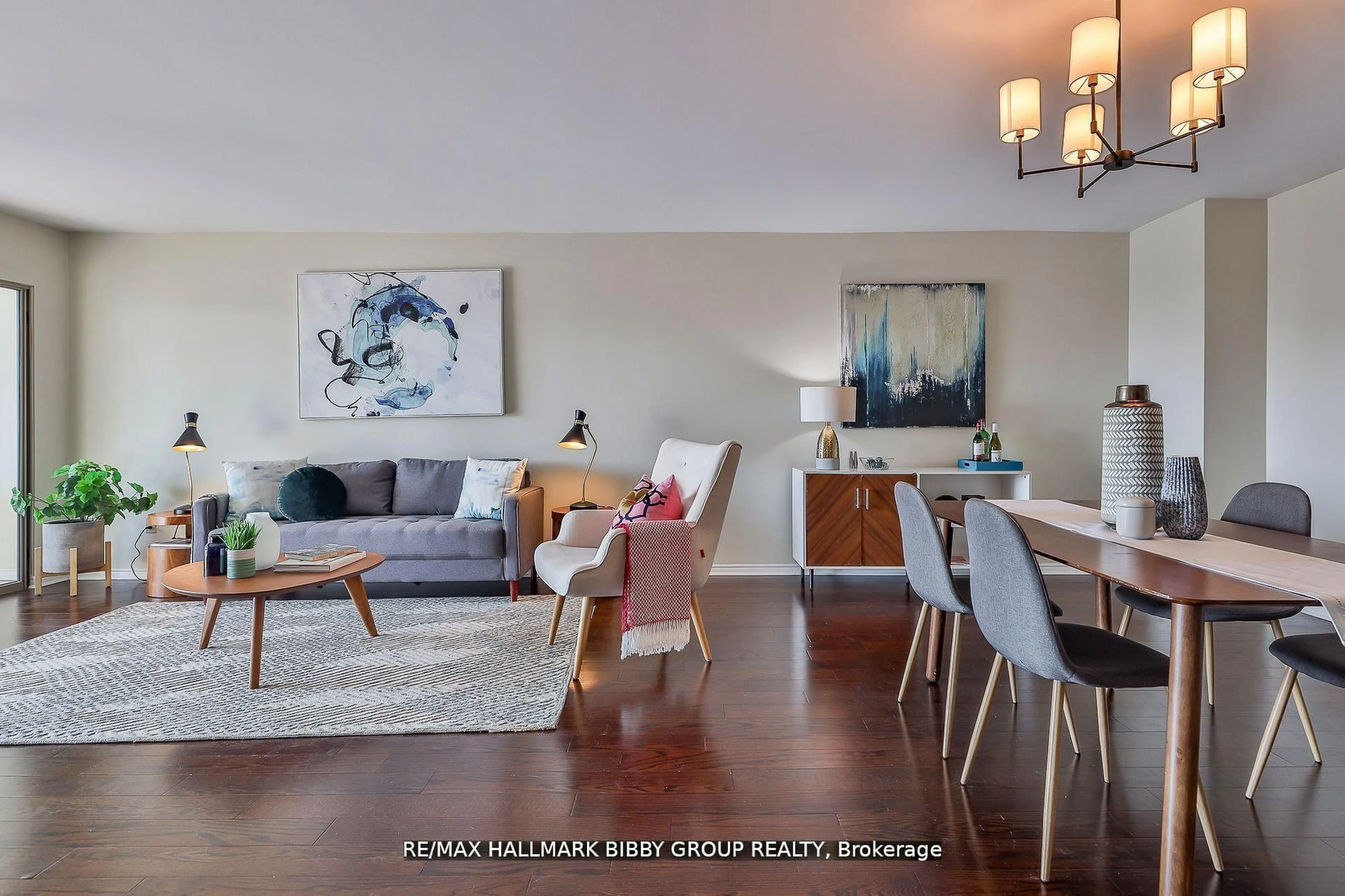 Living room with furniture, wood/laminate floor for 160 Frederick St #803, Toronto Ontario M5A 4H9