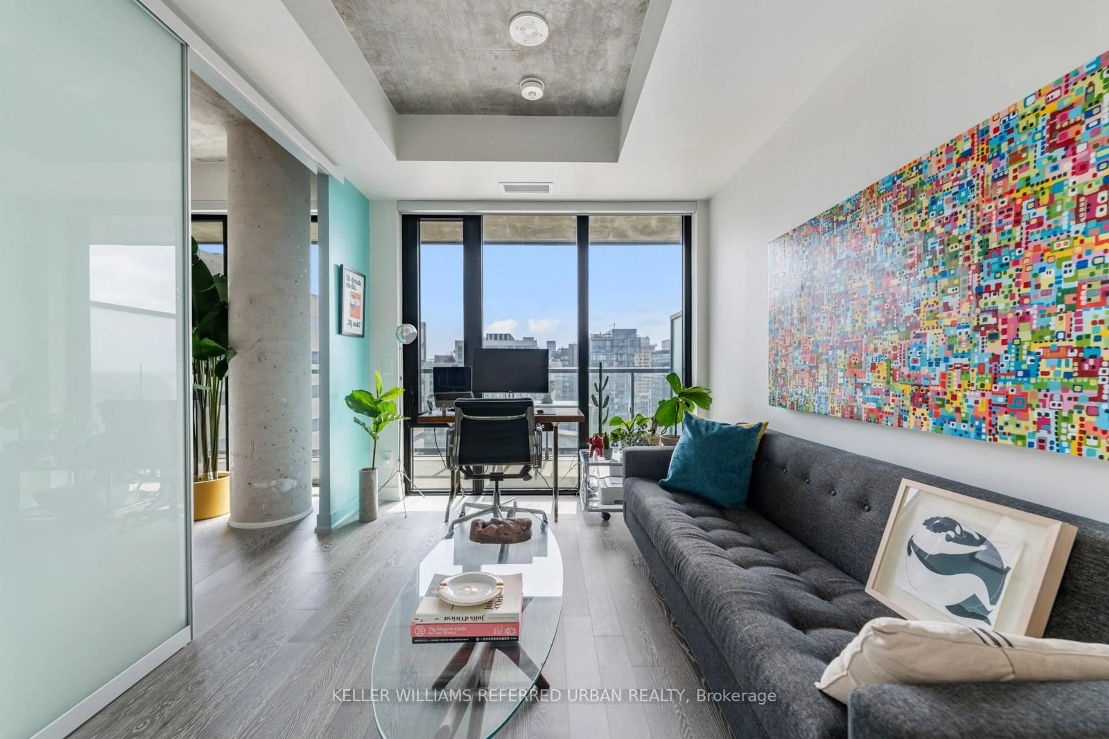 Living room with furniture, cement floor for 608 Richmond St #1206, Toronto Ontario M5V 0N9