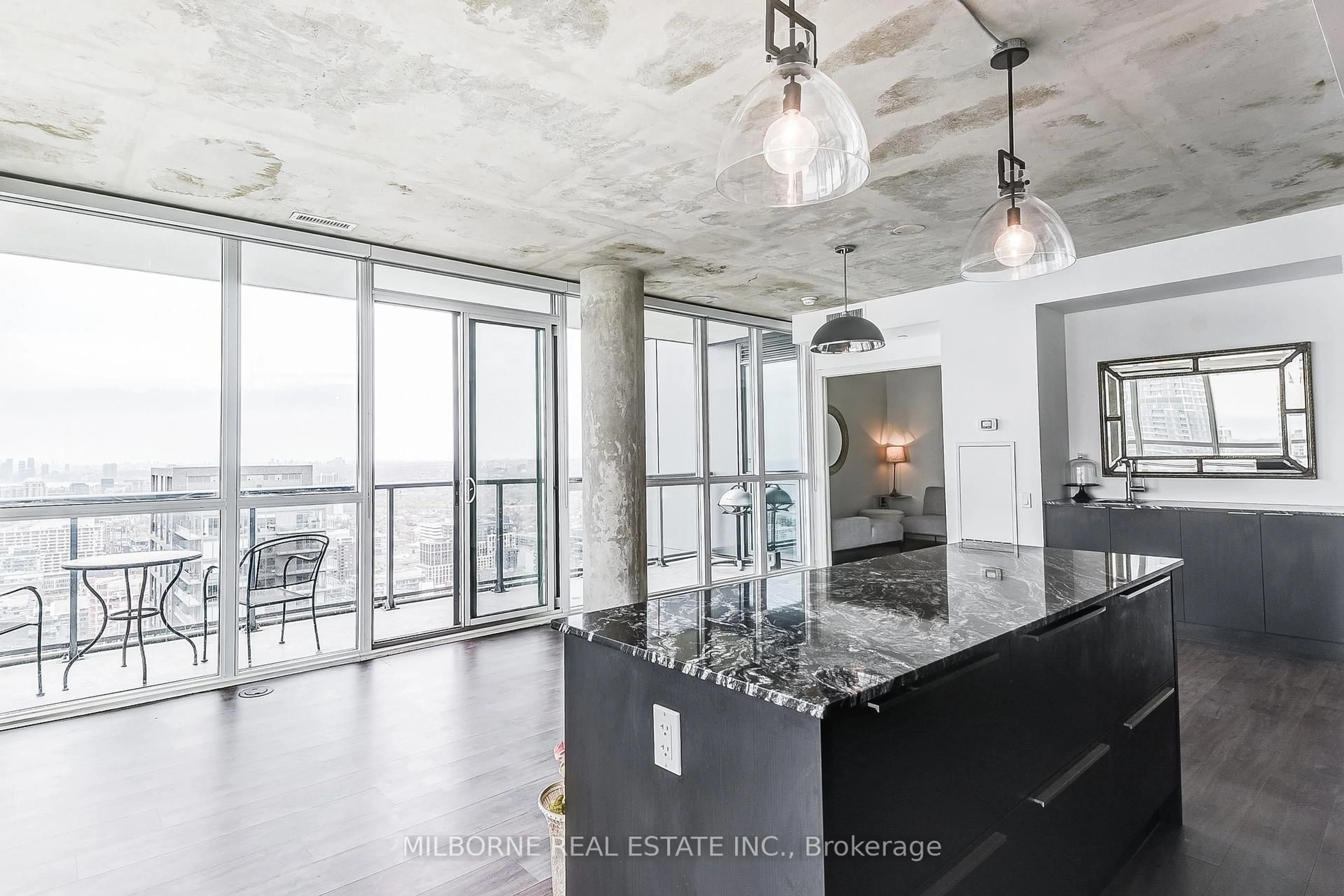 Open concept kitchen, cement floor for 88 Blue Jays Way #4005, Toronto Ontario M5V 2G3