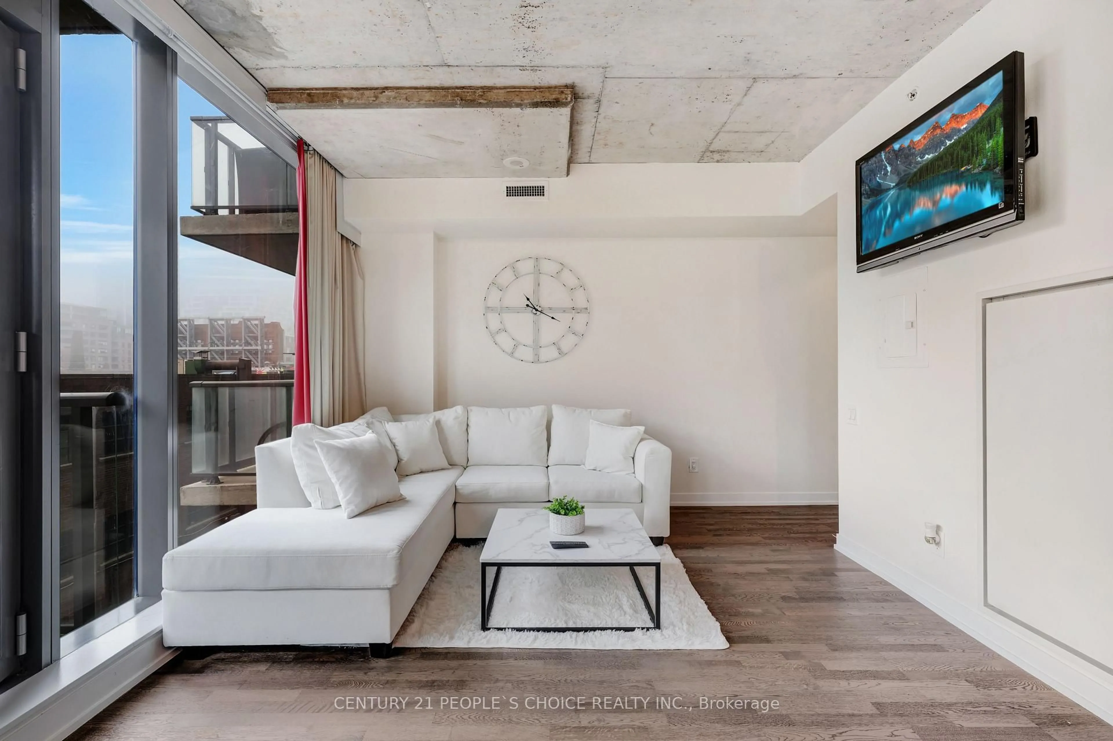 Living room with furniture, cement floor for 560 King St #305, Toronto Ontario M5V 1M3