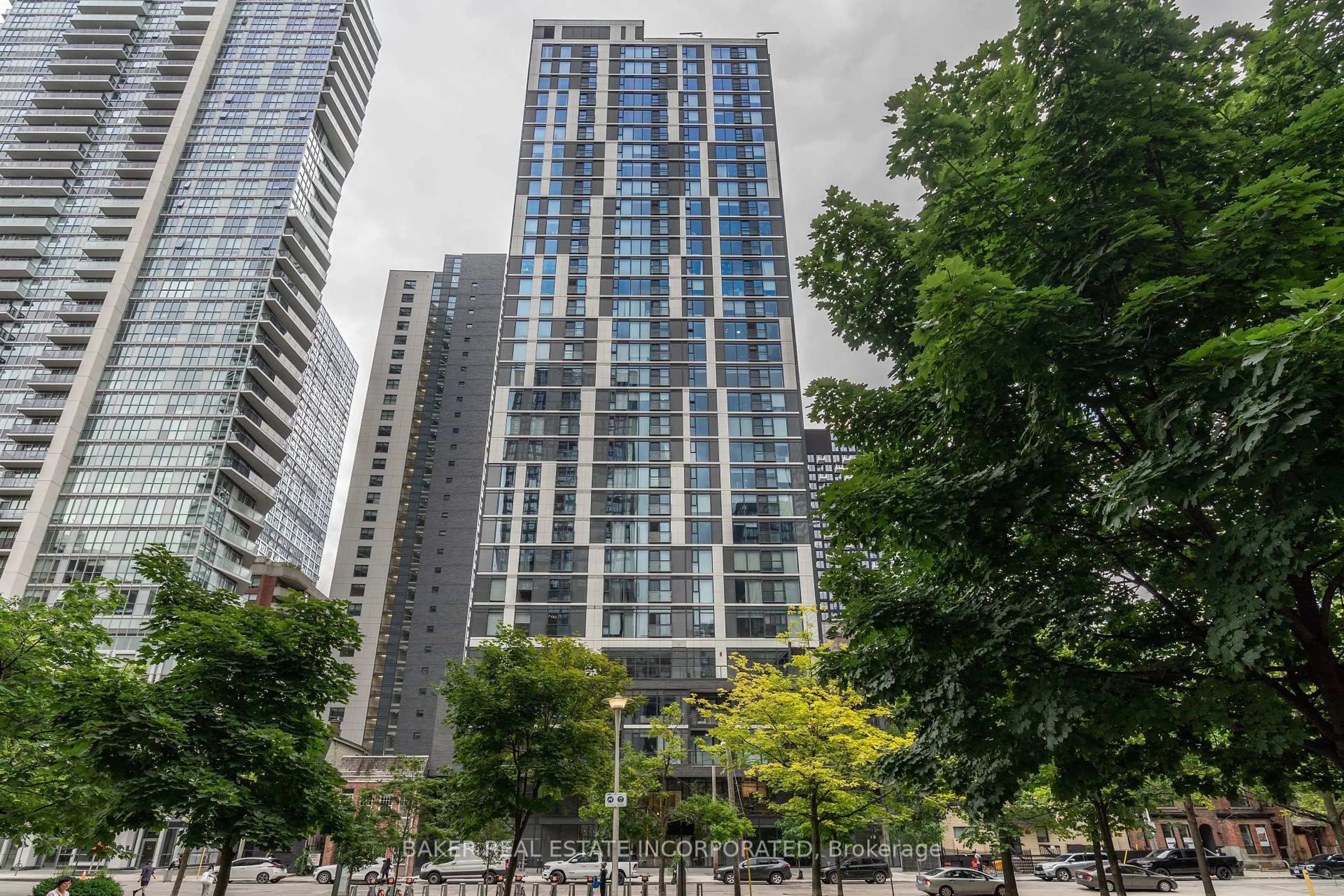 Patio, city buildings view from balcony for 65 Mutual St #405, Toronto Ontario M5B 0E5