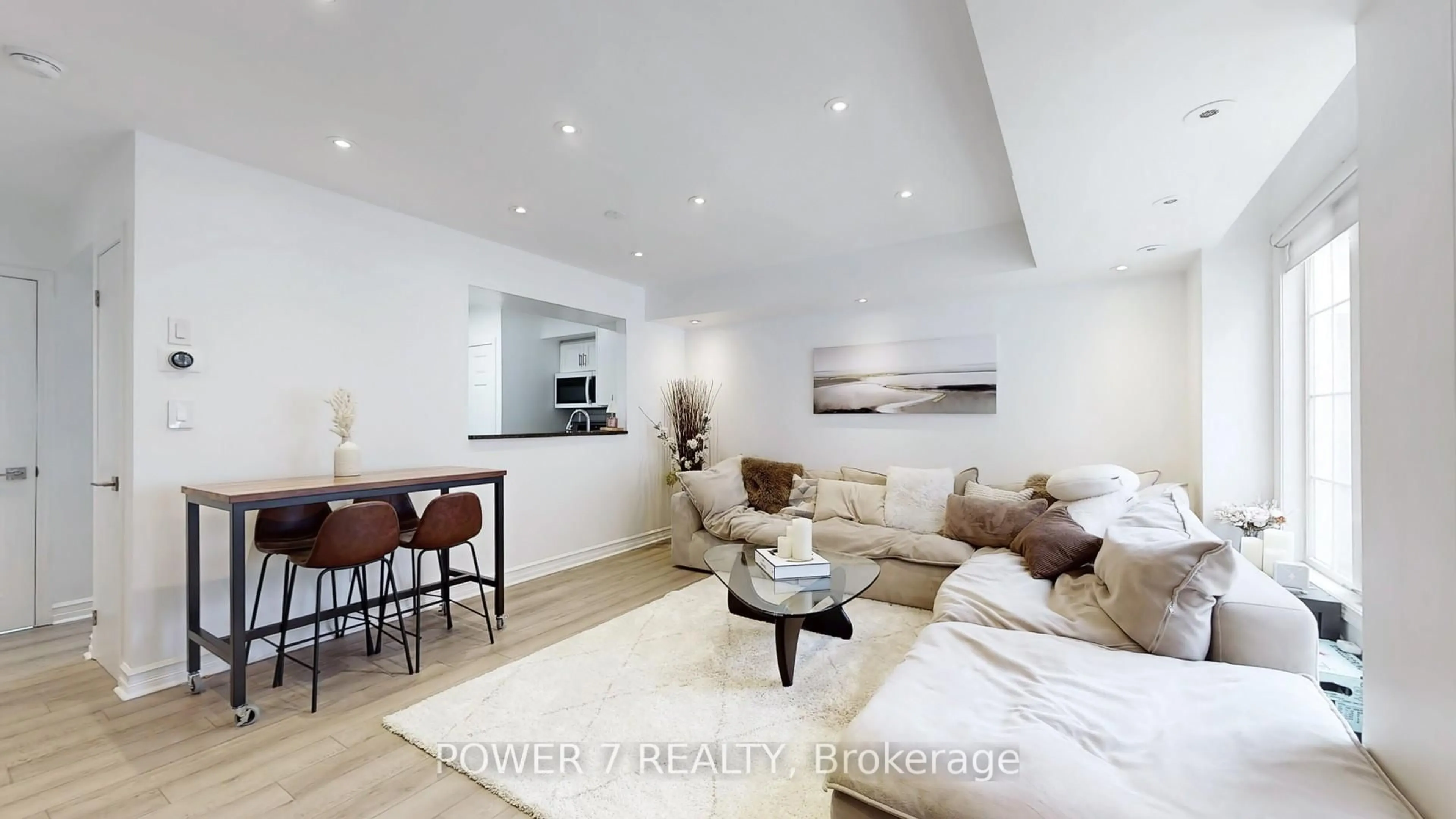 Living room with furniture, wood/laminate floor for 3 Everson Dr #152, Toronto Ontario M2N 7C2