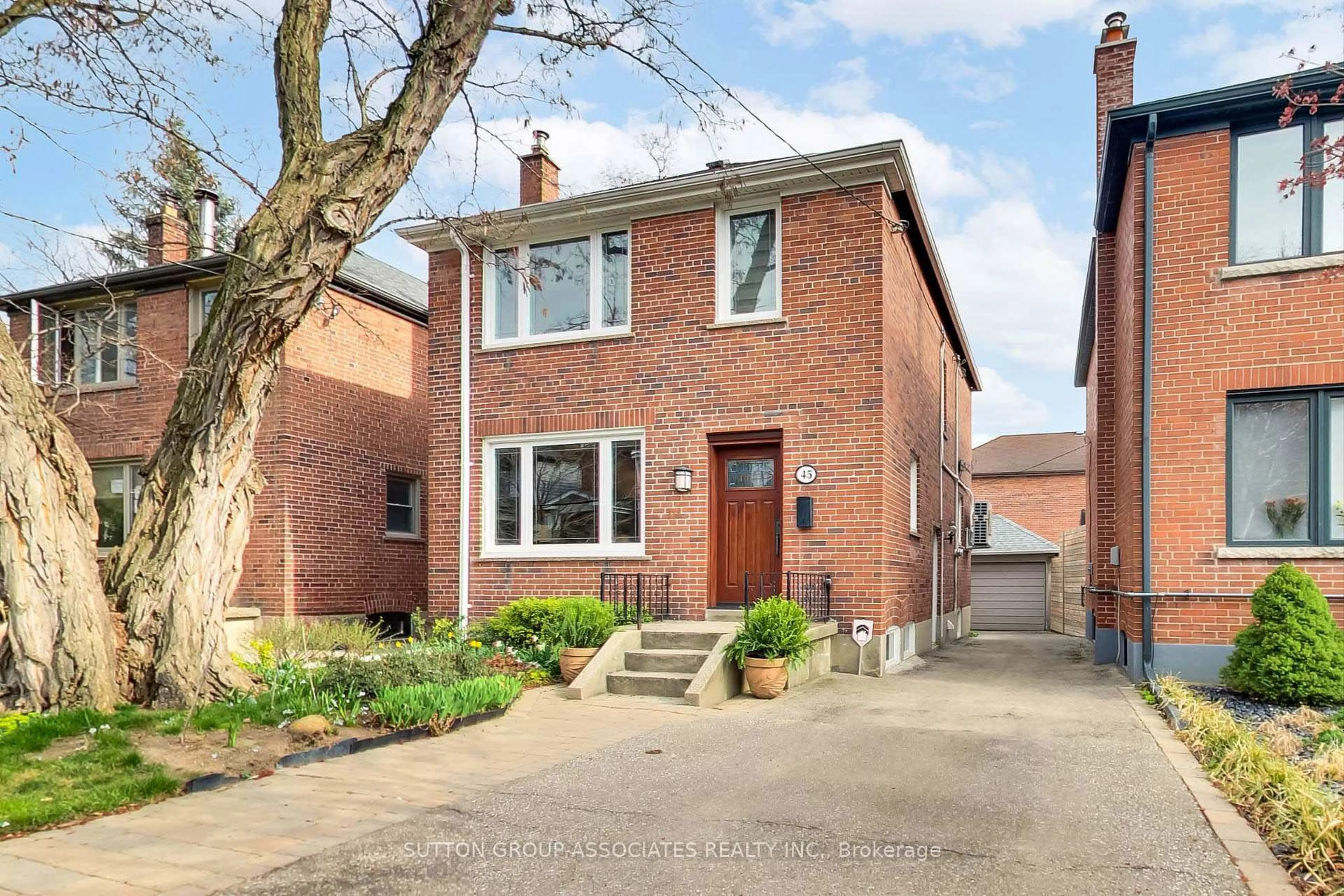 Home with brick exterior material, street for 45 Tyrrel Ave, Toronto Ontario M6G 2G1
