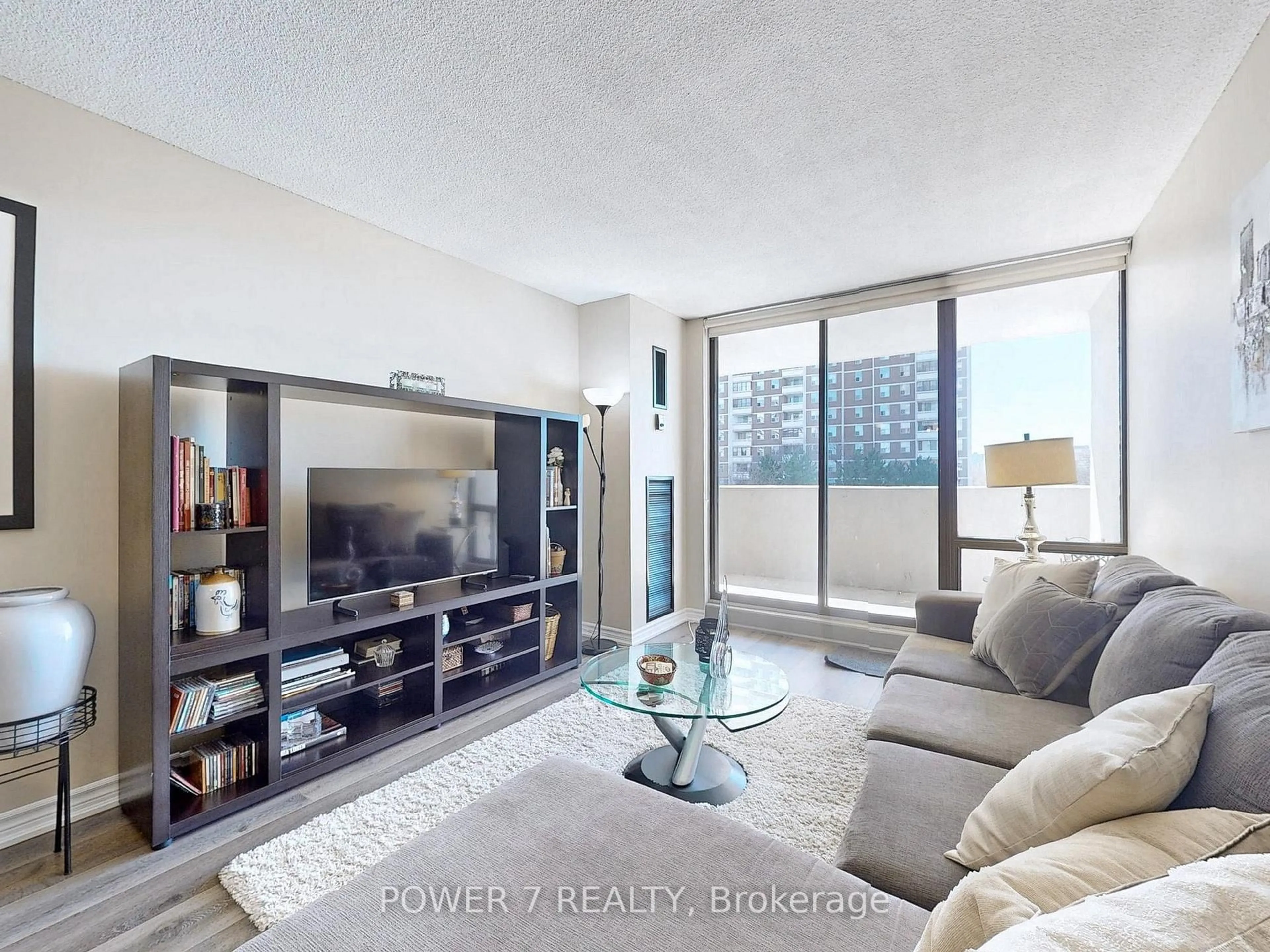Living room with furniture, unknown for 10 Tangreen Crt #407, Toronto Ontario M2M 4B9