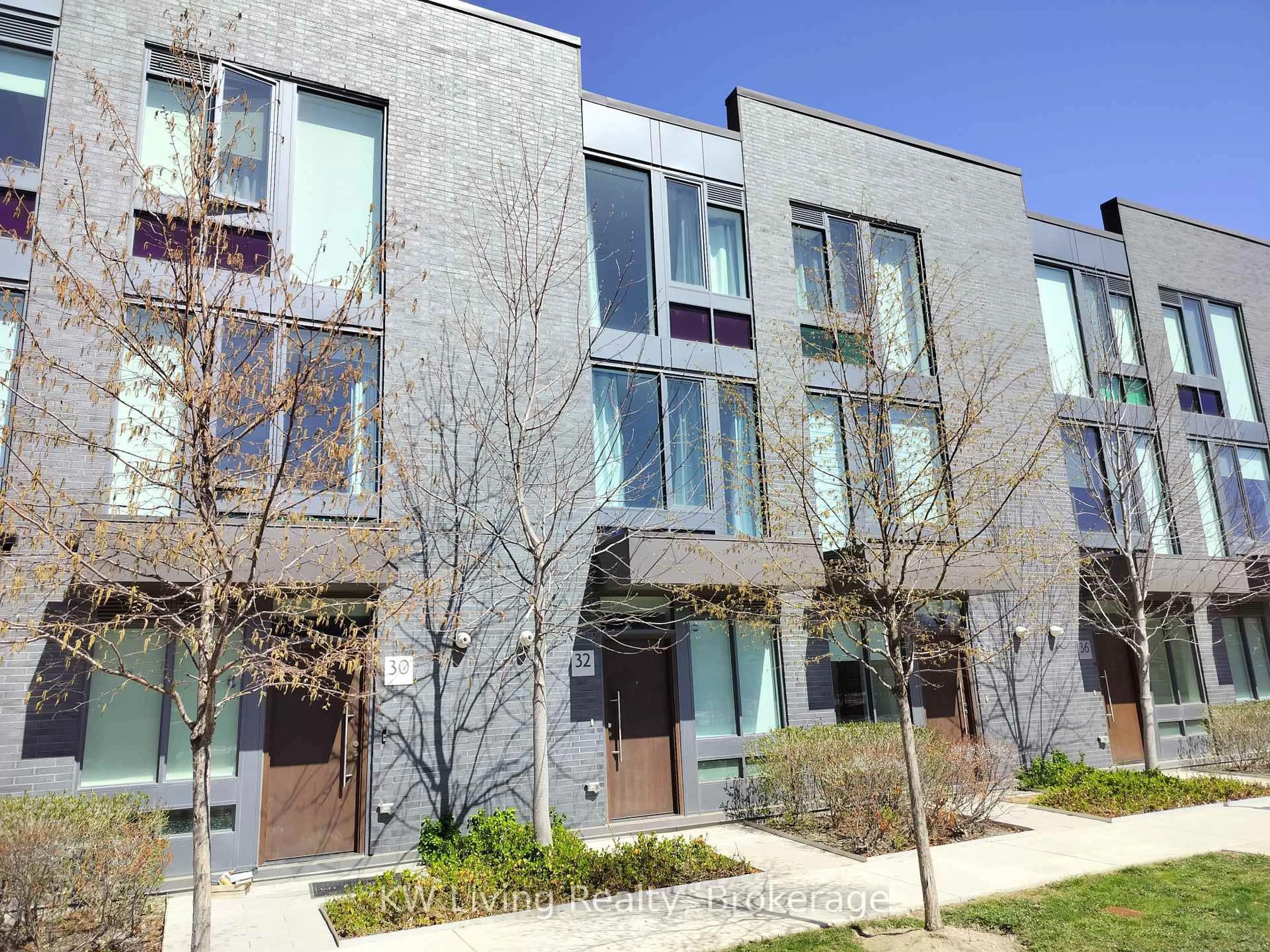 Home with brick exterior material, street for 32 Sonic Way, Toronto Ontario M3C 0P3