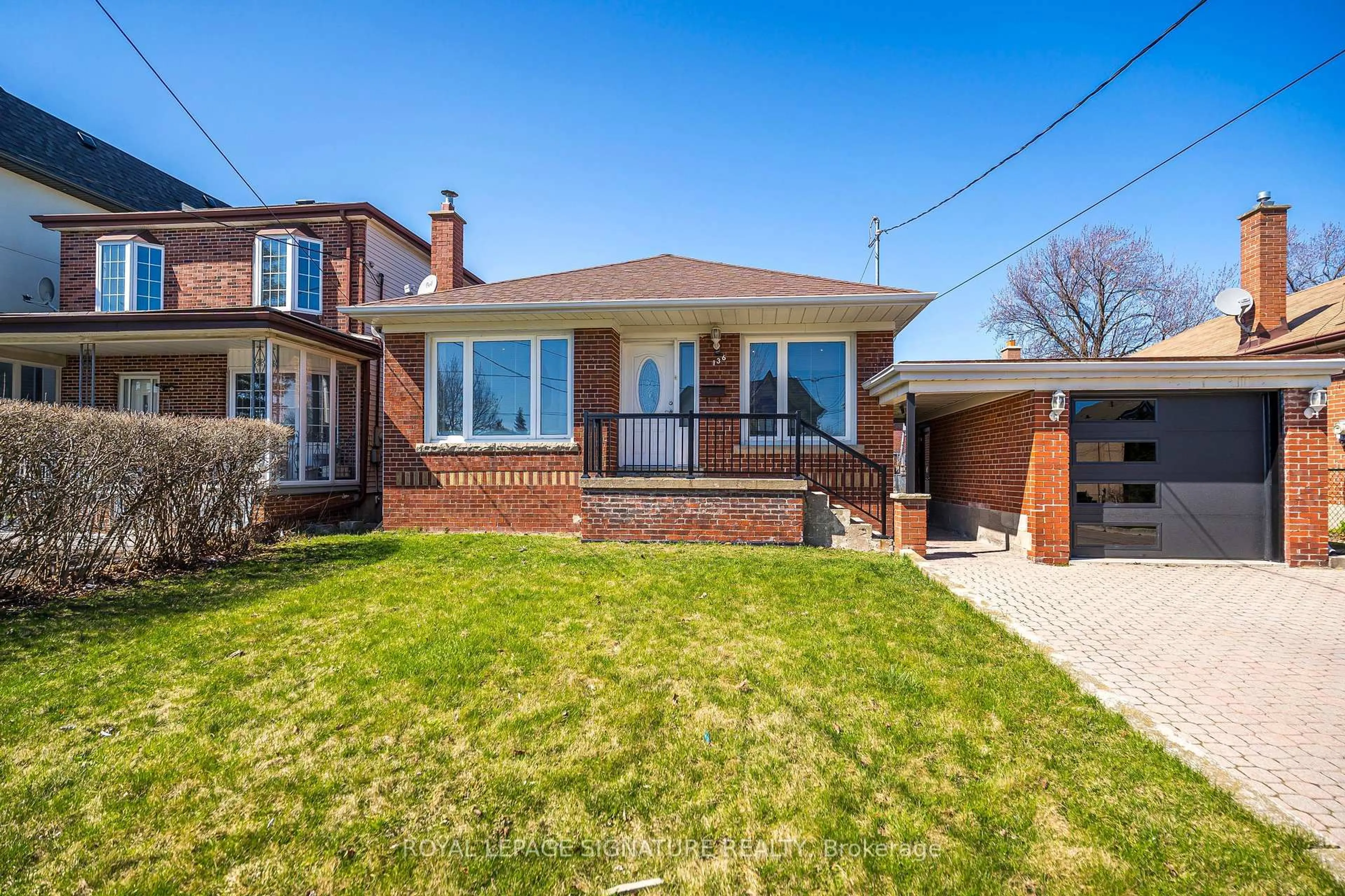 Home with brick exterior material, street for 136 Regina Ave, Toronto Ontario M6A 1R7