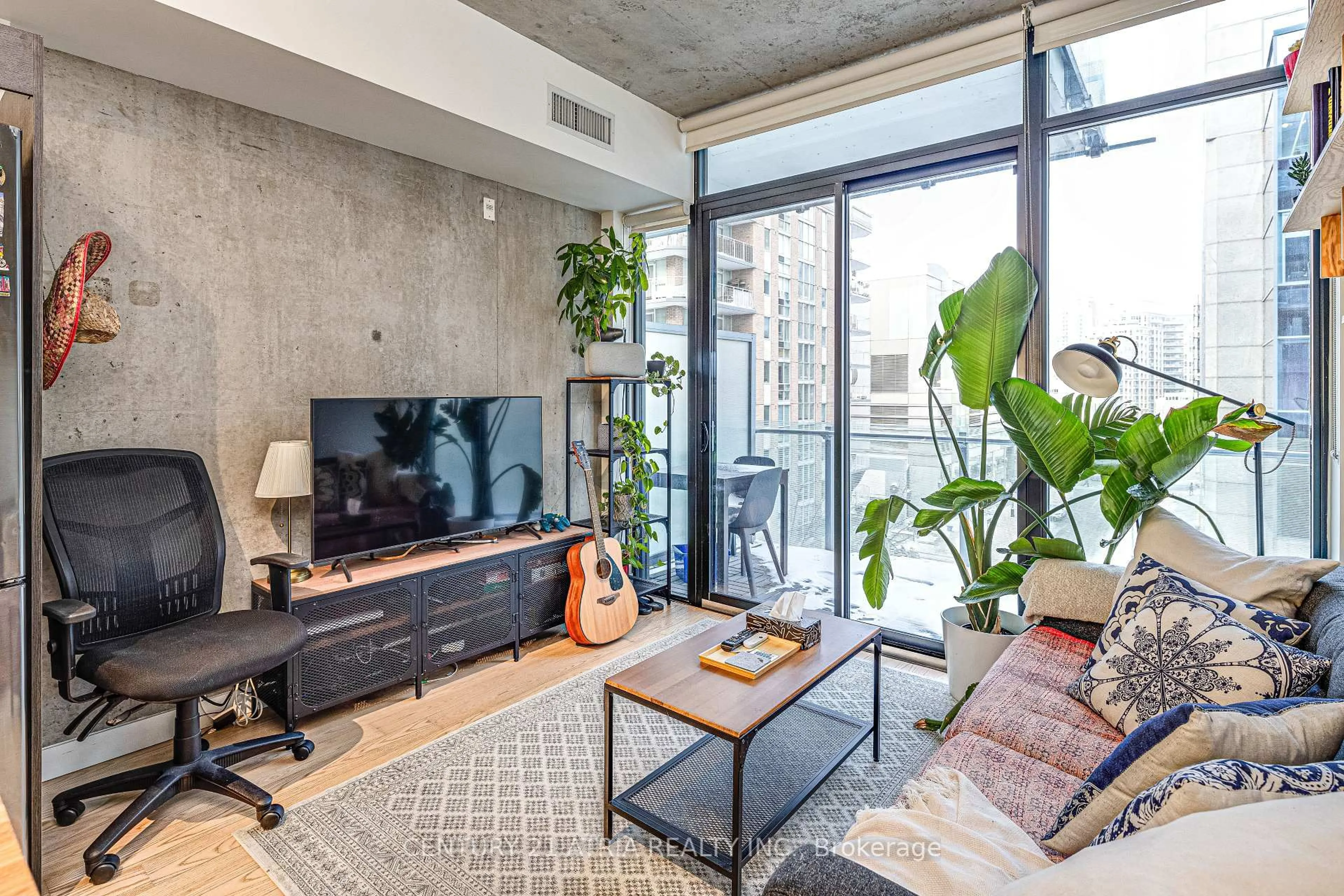 Living room with furniture, cement floor for 25 Stafford St #508, Toronto Ontario M5V 0G3