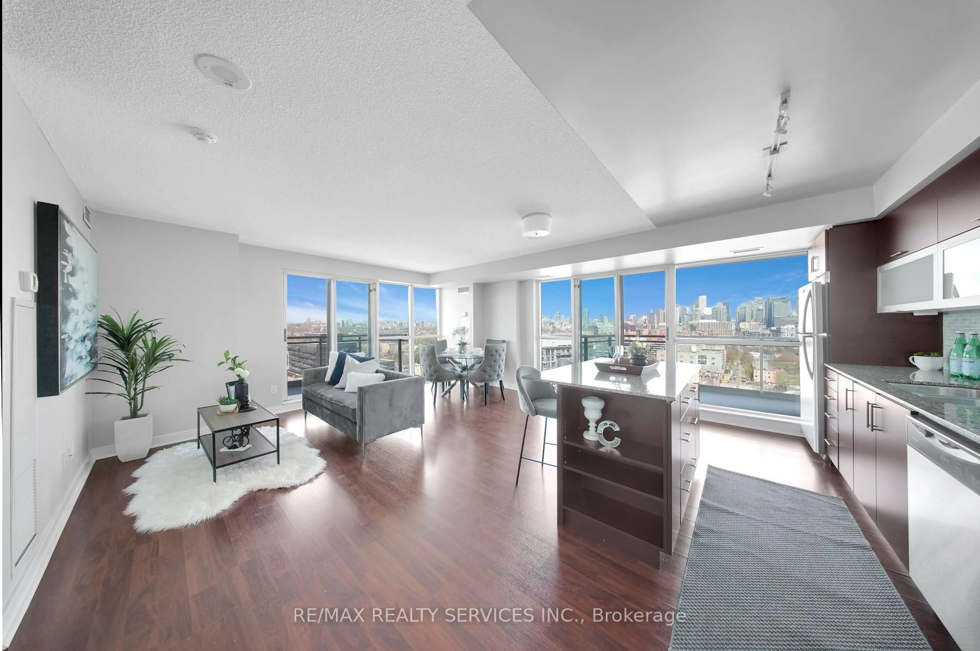 Living room with furniture, wood/laminate floor for 100 Western Battery Rd #2009, Toronto Ontario M6K 3S2