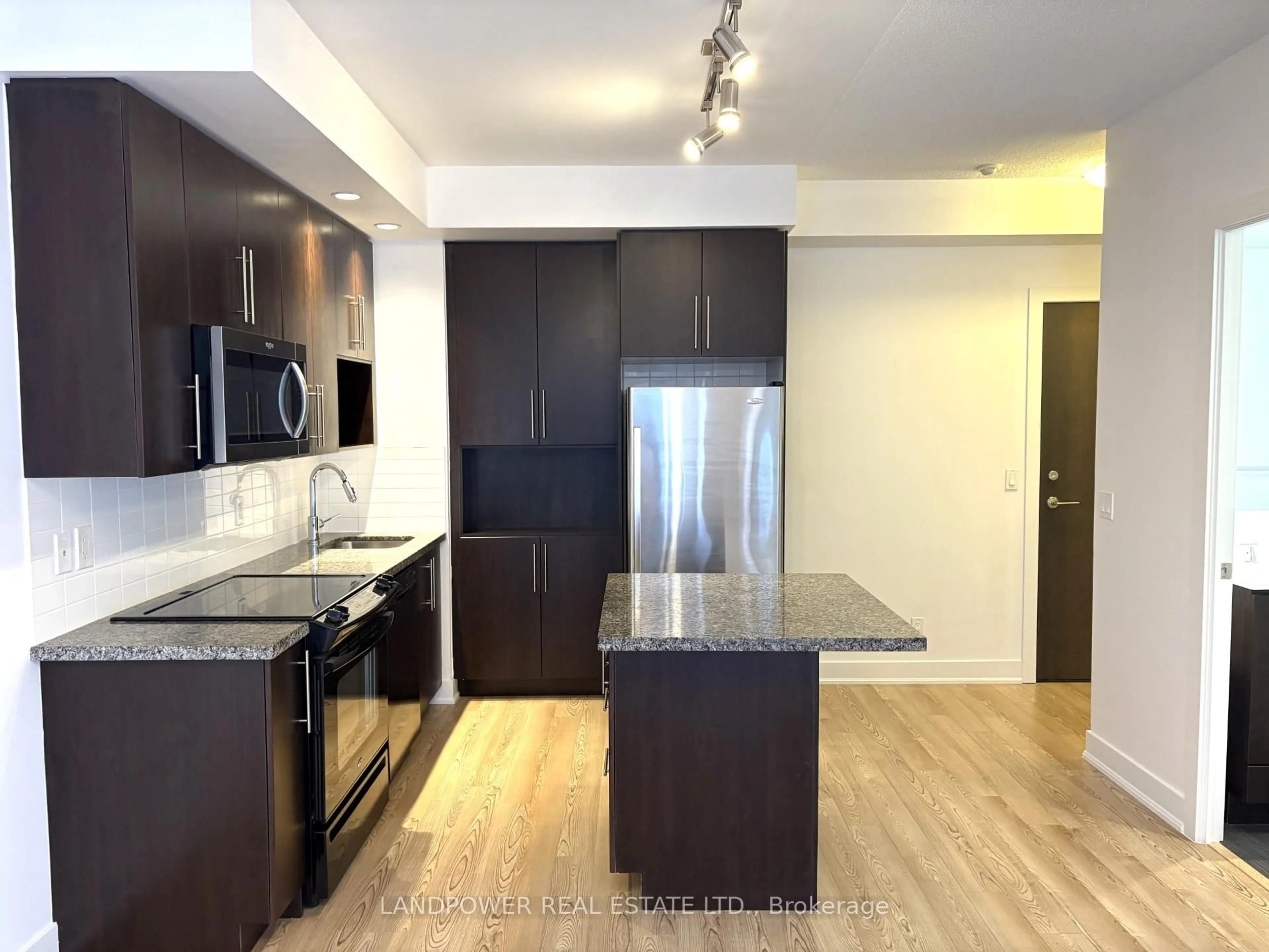 Open concept kitchen, wood/laminate floor for 28 Linden St #1209, Toronto Ontario M4Y 0A4