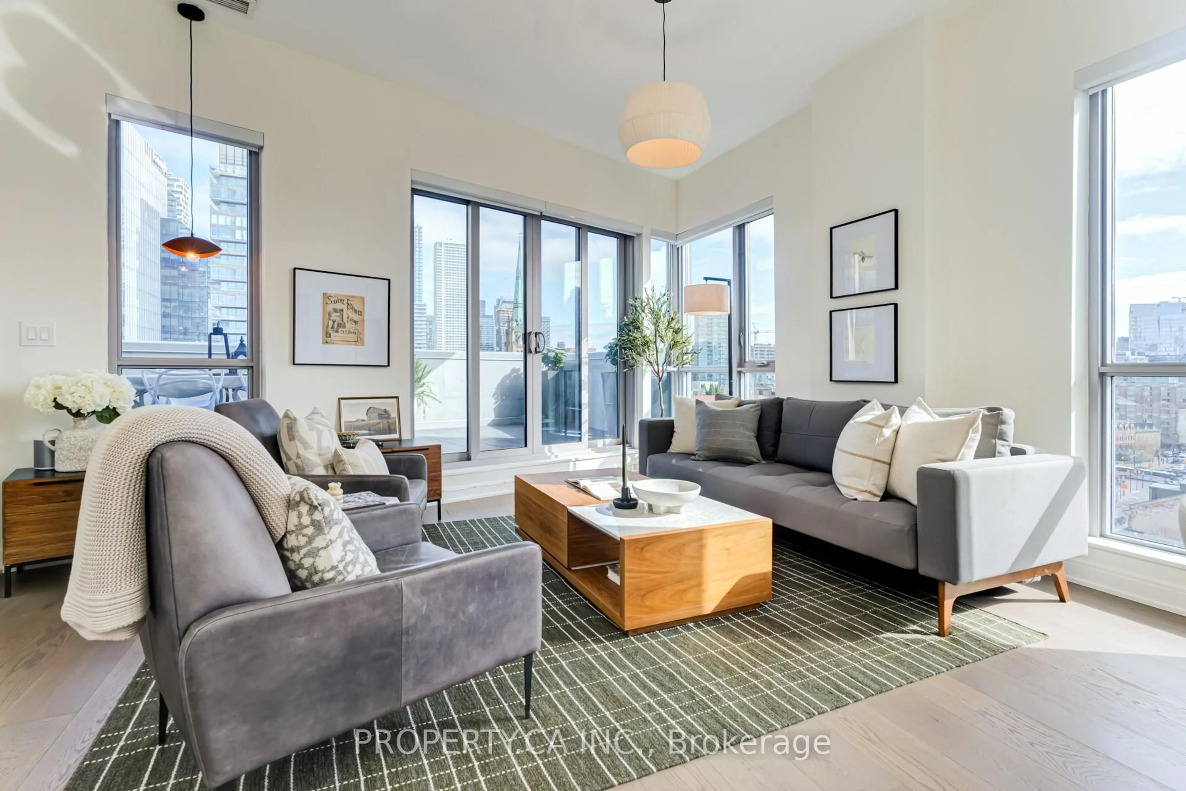 Living room with furniture, unknown for 55 Front St #Ph1205, Toronto Ontario M5J 1B3