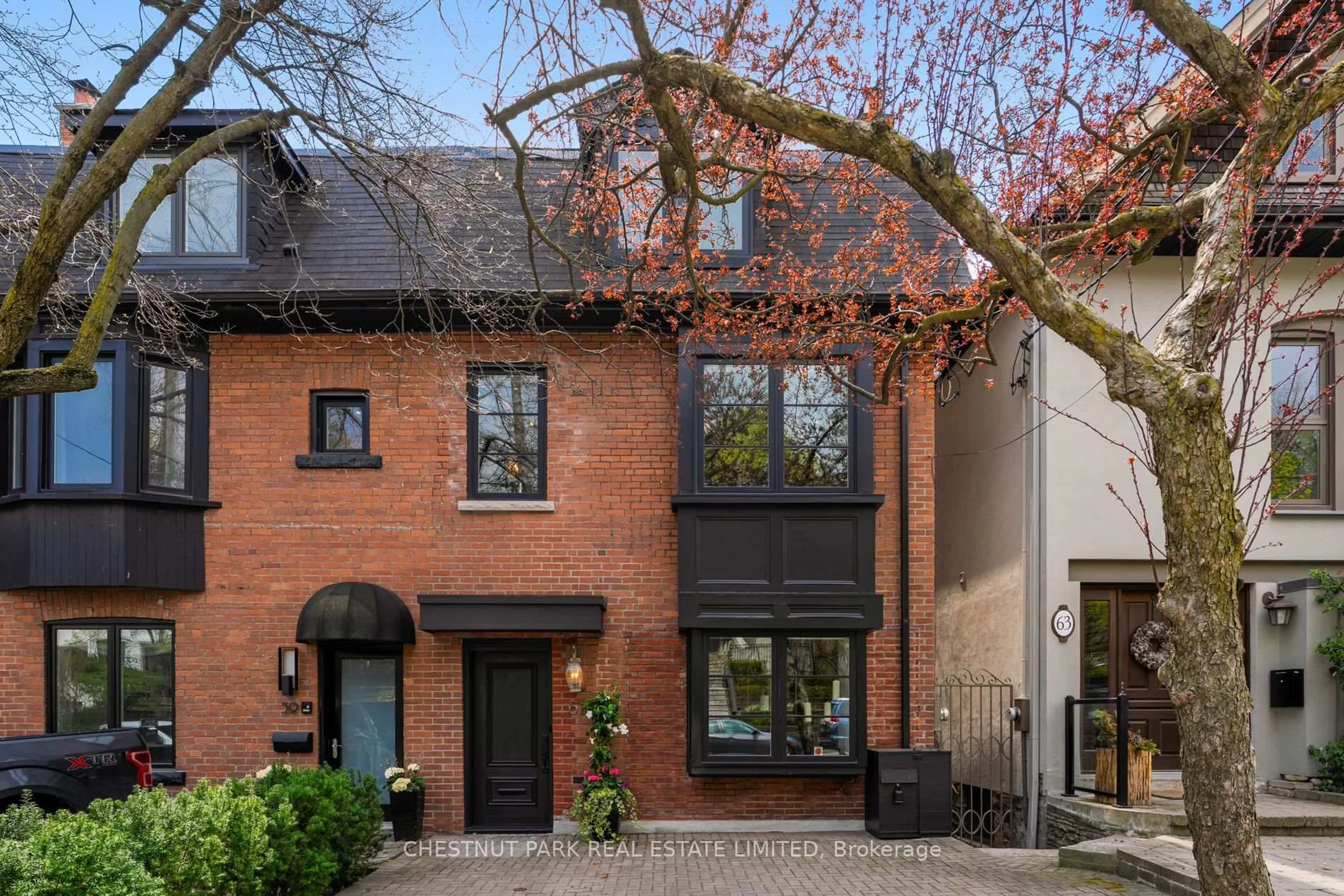 Home with brick exterior material, street for 61 Woodlawn Ave, Toronto Ontario M4V 1G6
