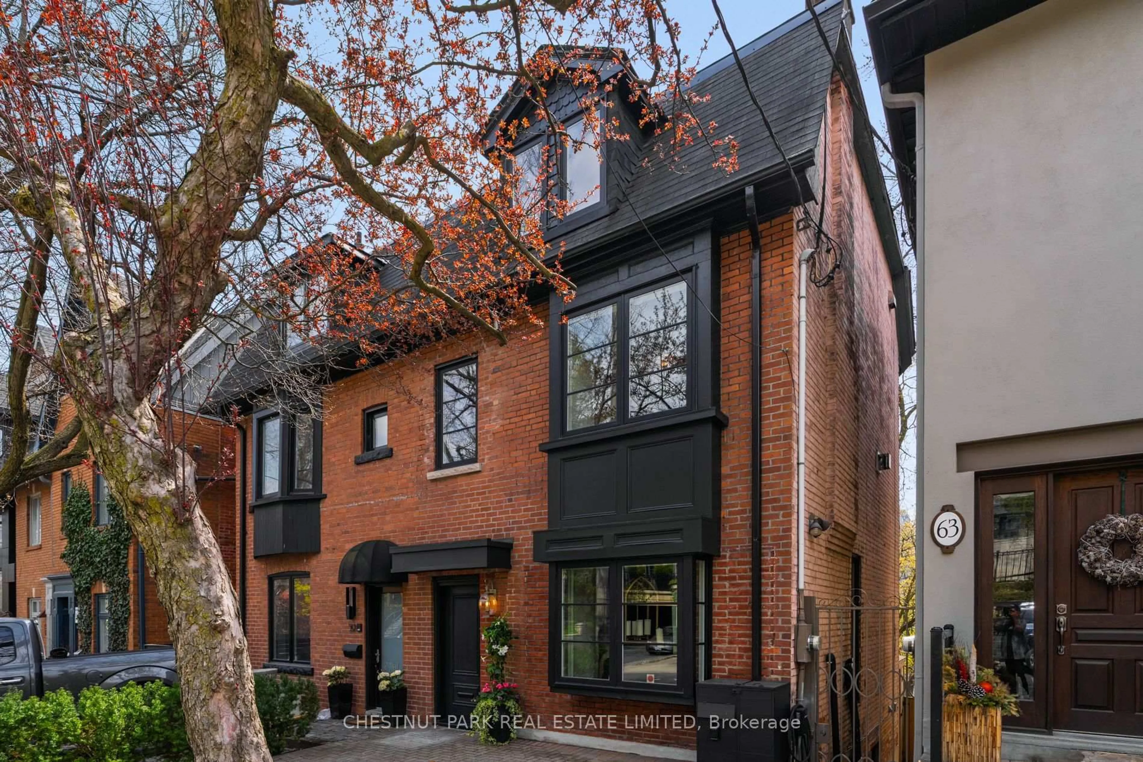 Home with brick exterior material, street for 61 Woodlawn Ave, Toronto Ontario M4V 1G6