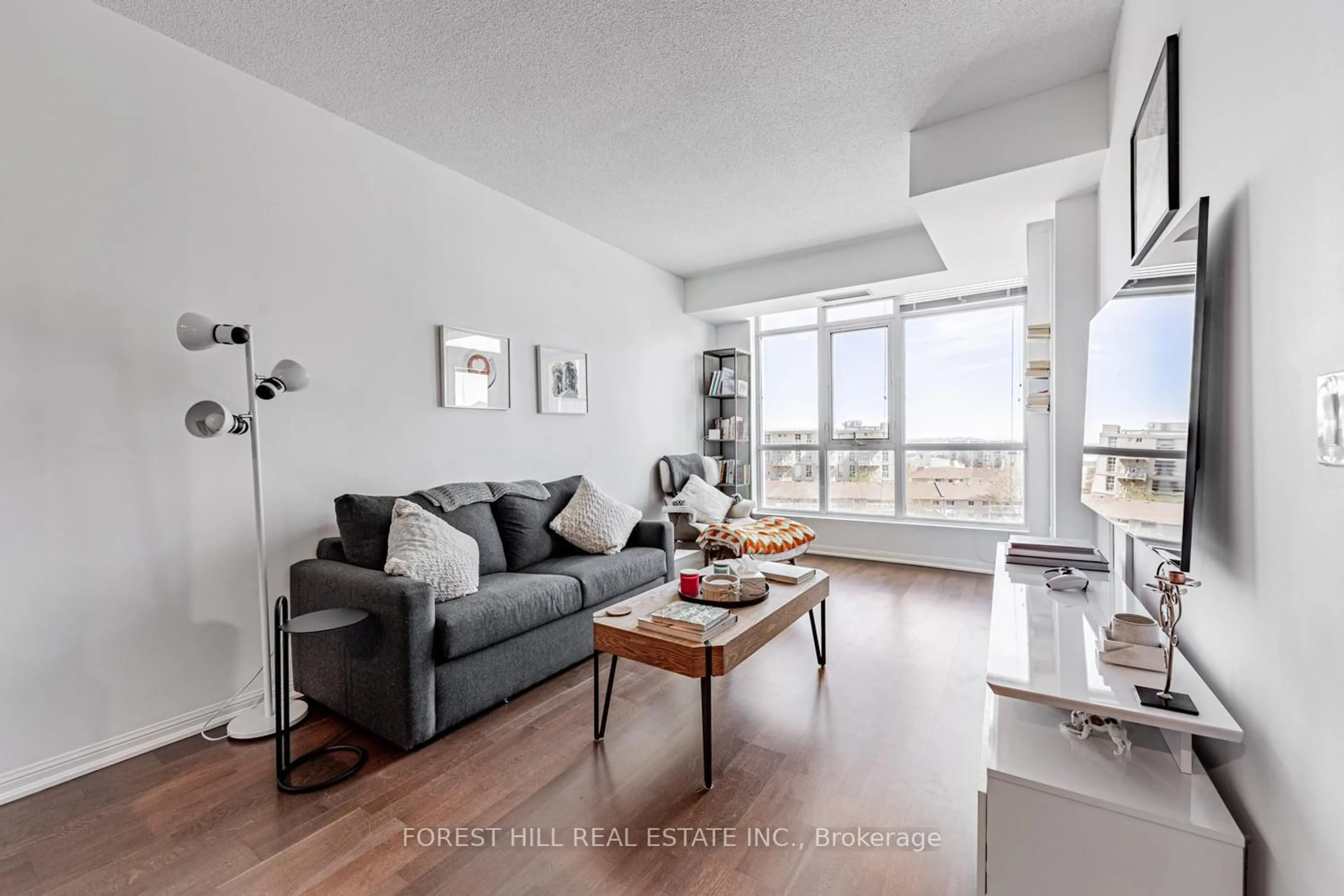 Living room with furniture, unknown for 21 Grand Magazine St #816, Toronto Ontario M5V 1B5