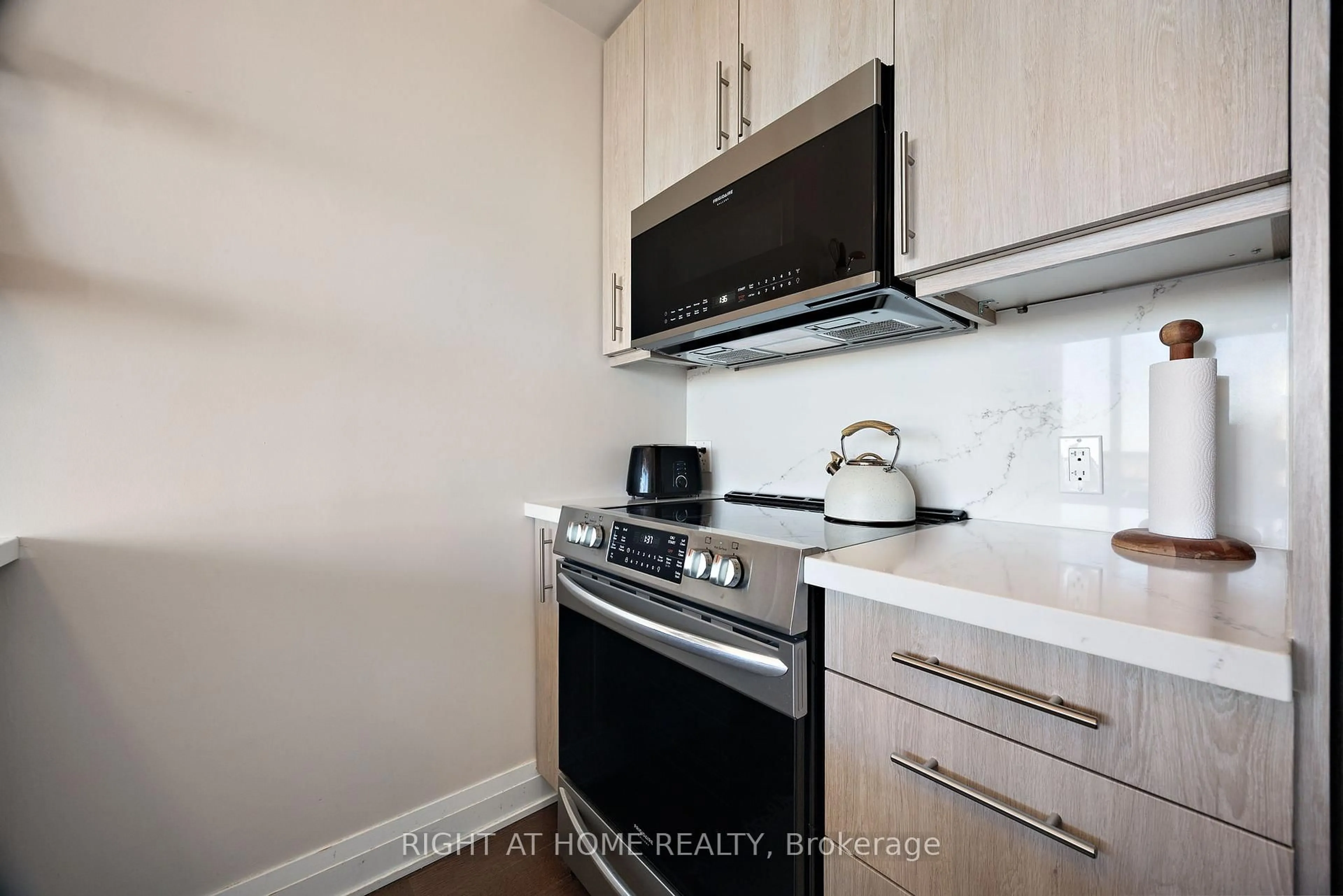 Standard kitchen, wood/laminate floor for 530 St Clair Ave #1503, Toronto Ontario M6C 0A2