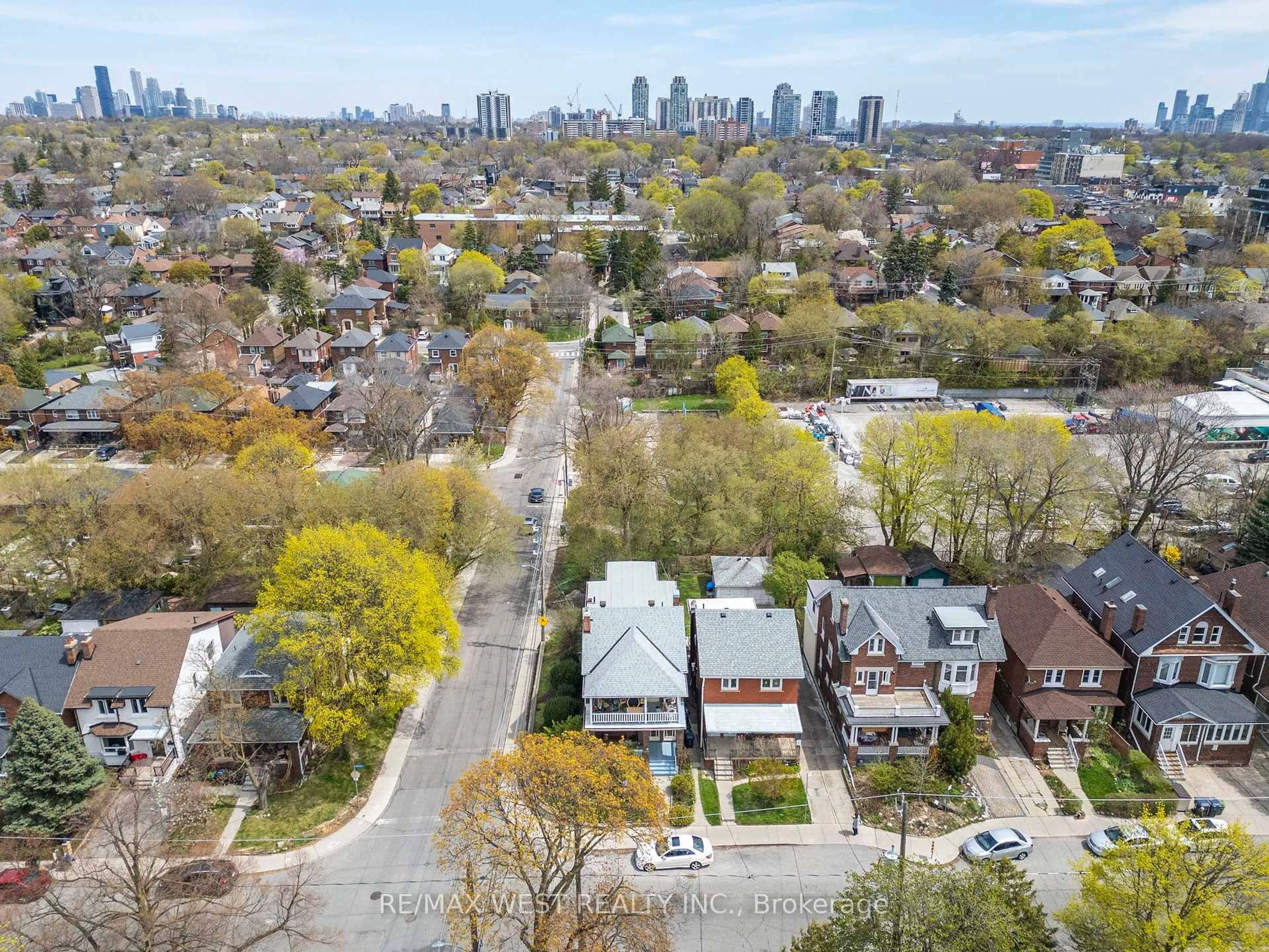 A pic from outside/outdoor area/front of a property/back of a property/a pic from drone, city buildings view from balcony for 53 Robina Ave, Toronto Ontario M6C 3Y5