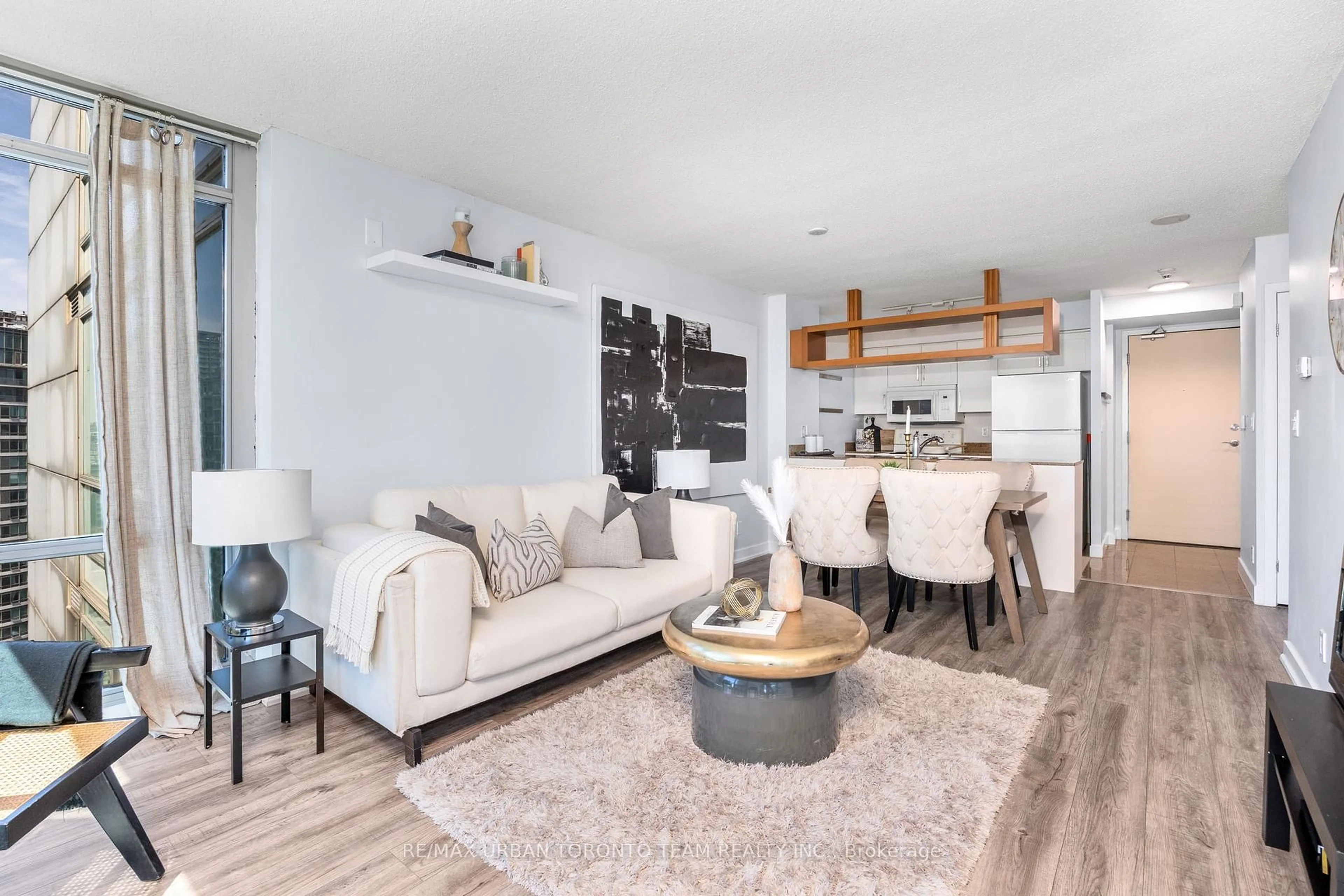 Living room with furniture, wood/laminate floor for 81 Navy Wharf Crt #2909, Toronto Ontario M5V 3S2