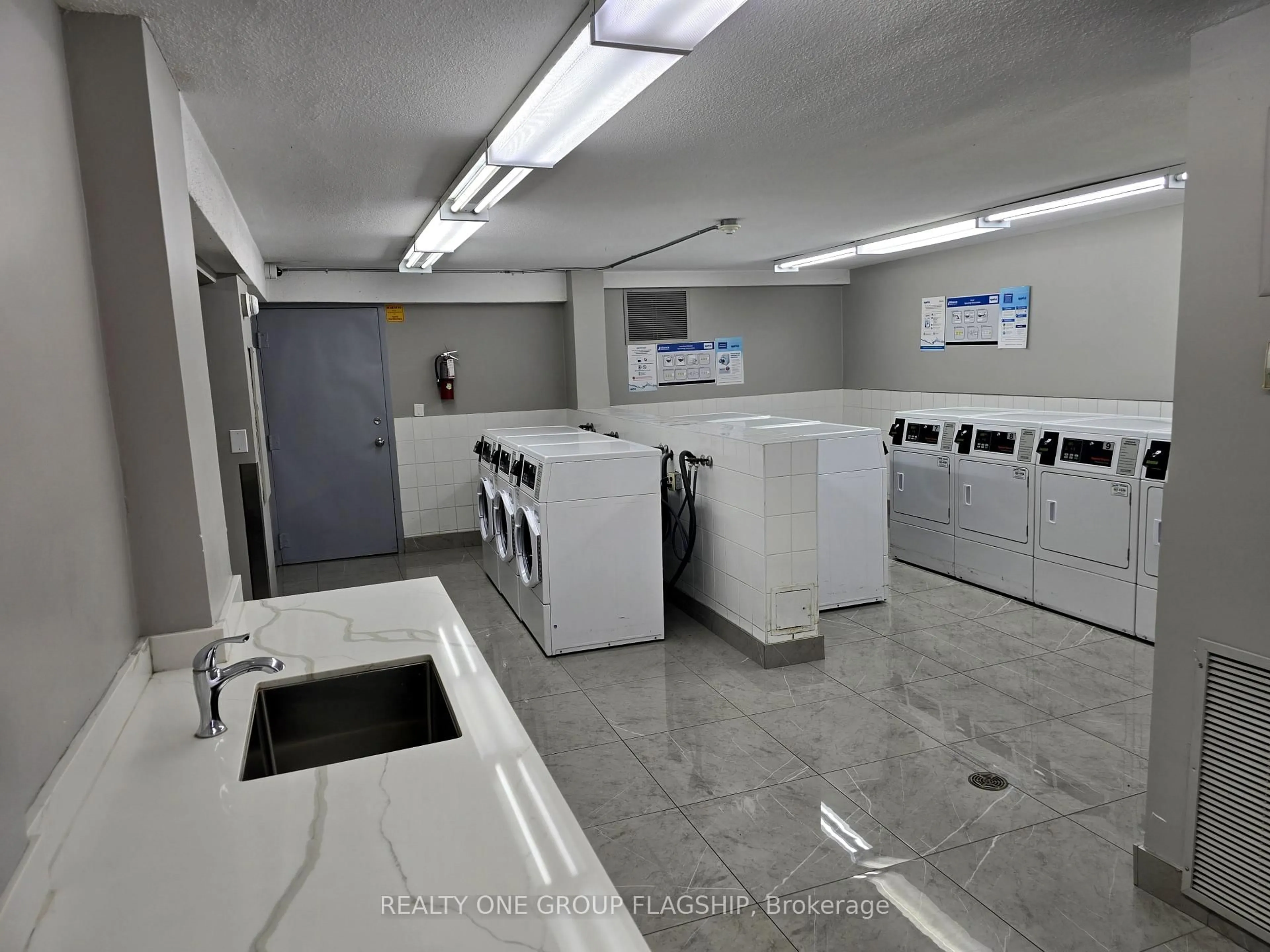 Kitchen with laundary machines, unknown for 10 Edgecliff Gfwy #1009, Toronto Ontario M3C 3A3