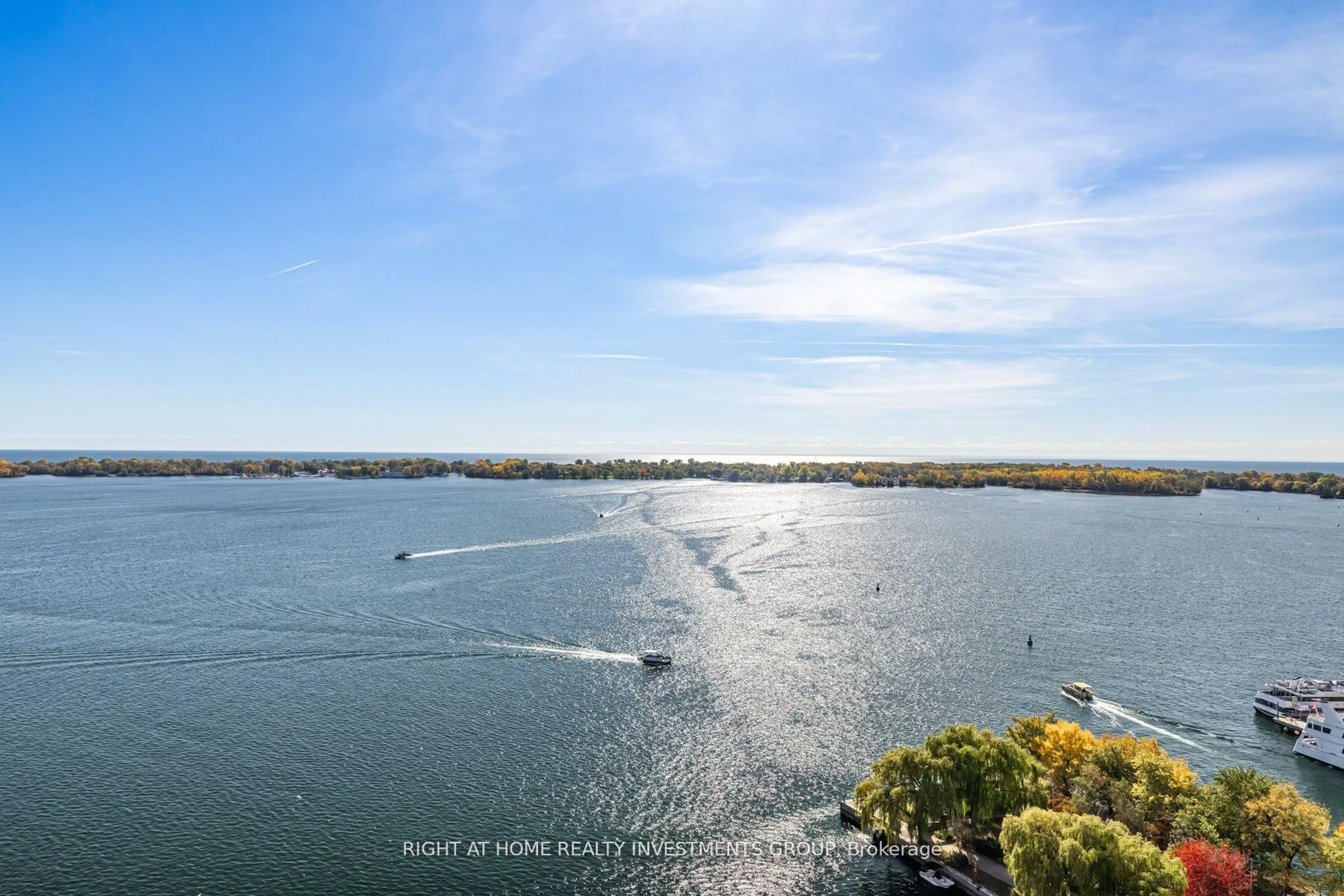 A pic from outside/outdoor area/front of a property/back of a property/a pic from drone, water/lake/river/ocean view for 65 Harbour Sq #1910, Toronto Ontario M5J 2L4