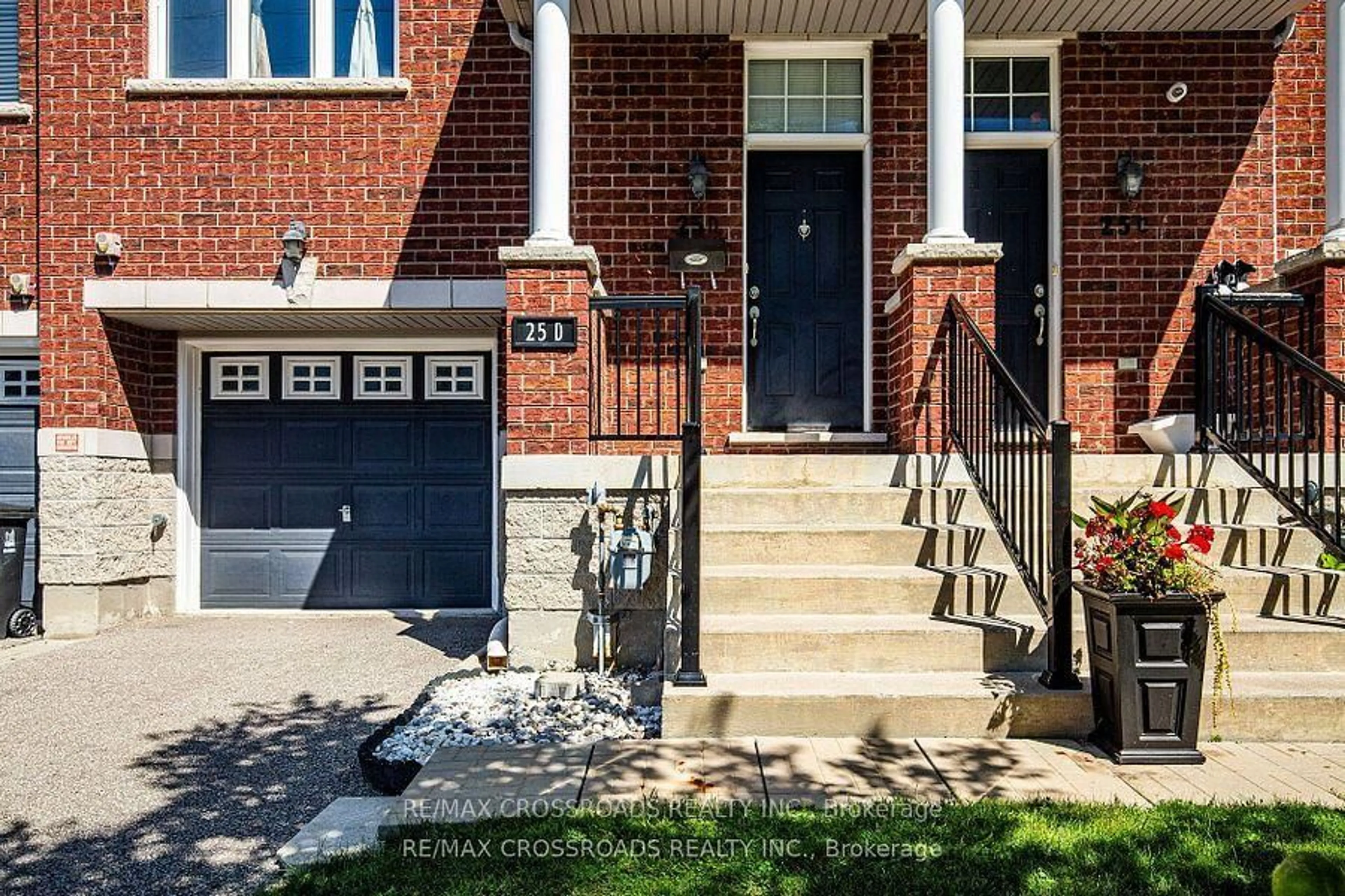 Home with brick exterior material, street for 25D Hobson Ave, Toronto Ontario M4A 0A4