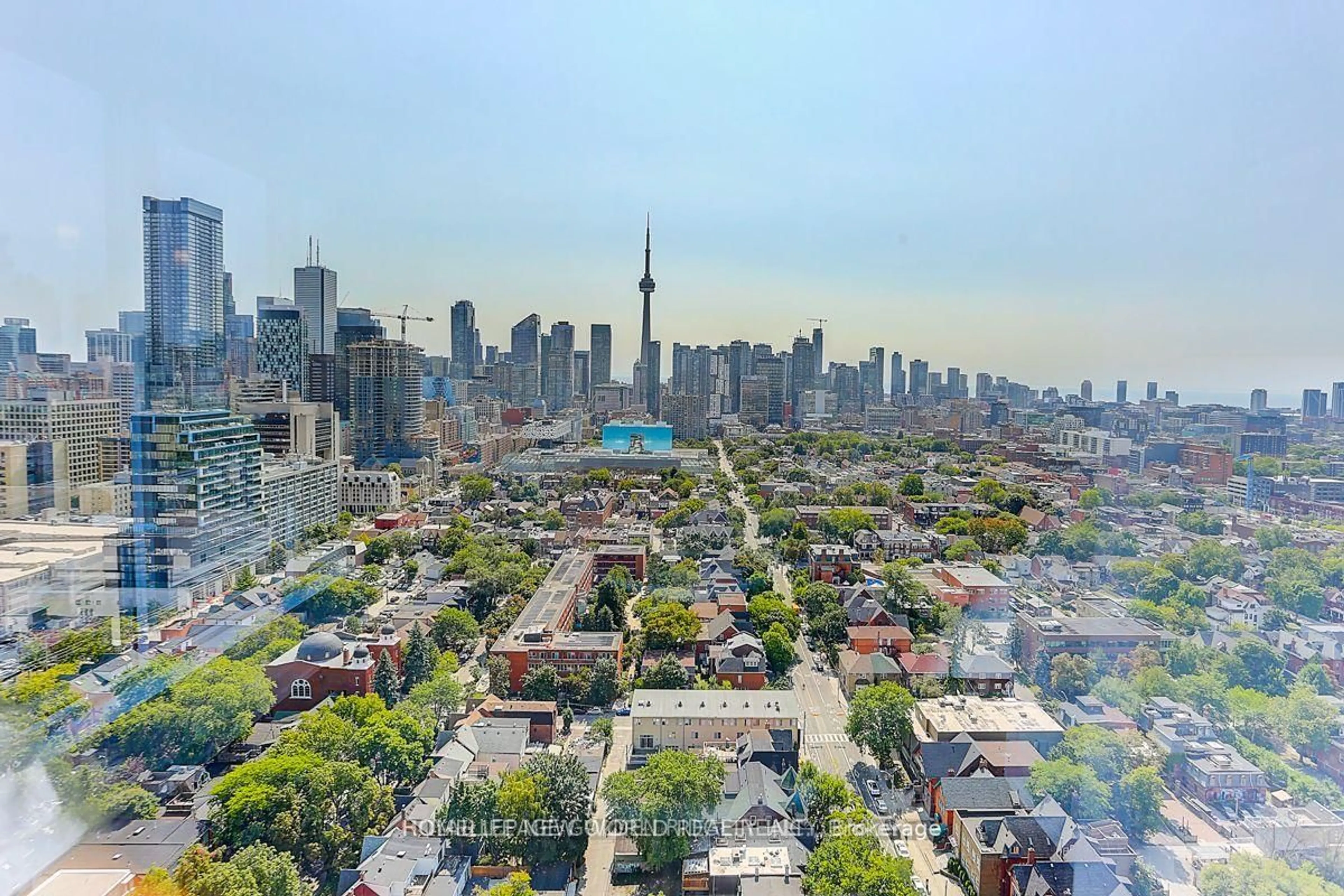 A pic from outside/outdoor area/front of a property/back of a property/a pic from drone, city buildings view from balcony for 203 College St #1408, Toronto Ontario M5T 1P9