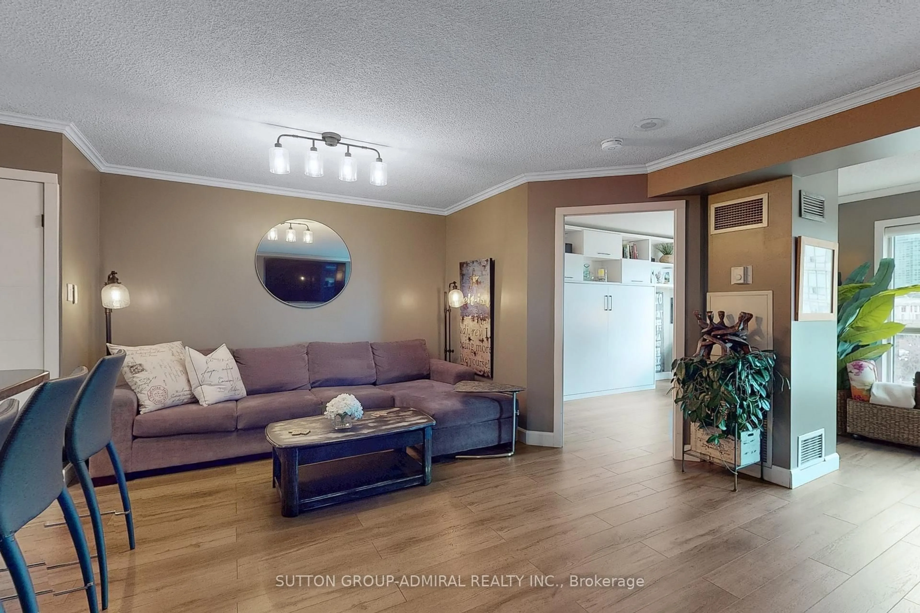 Living room with furniture, wood/laminate floor for 600 Queens Quay #705, Toronto Ontario M5V 3M3