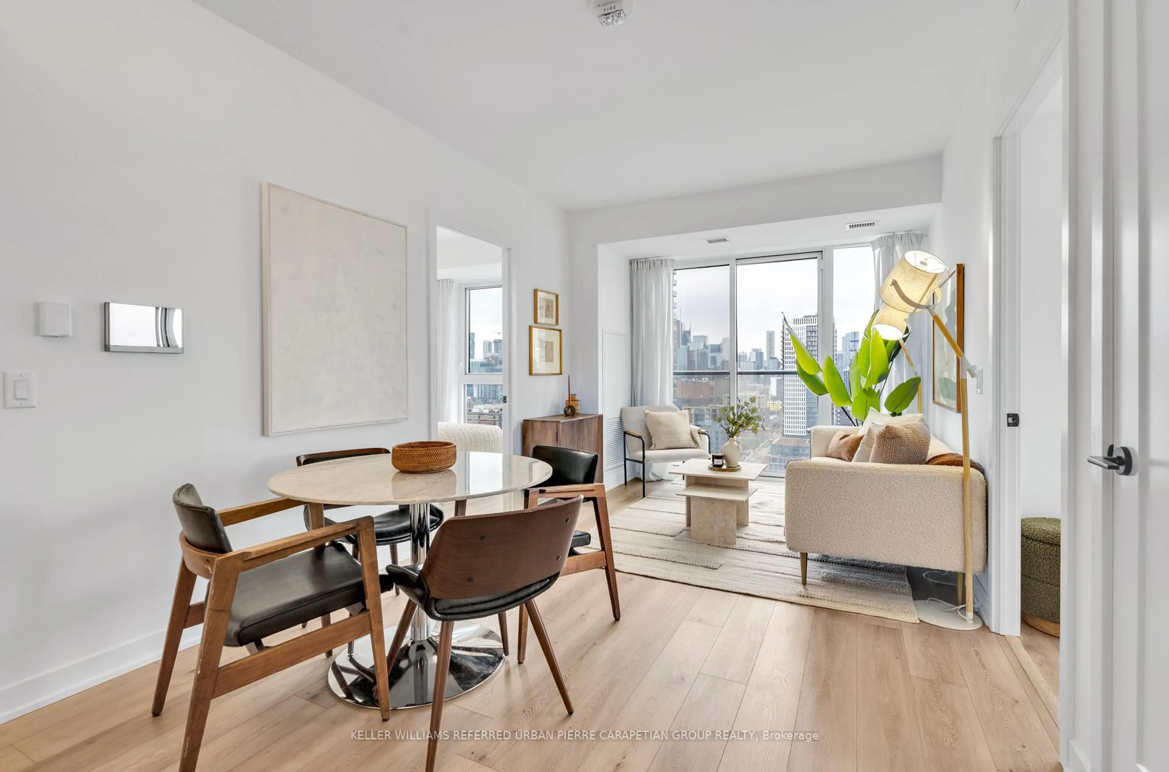 Living room with furniture, wood/laminate floor for 5 Defries St #1908, Toronto Ontario M5A 0W7
