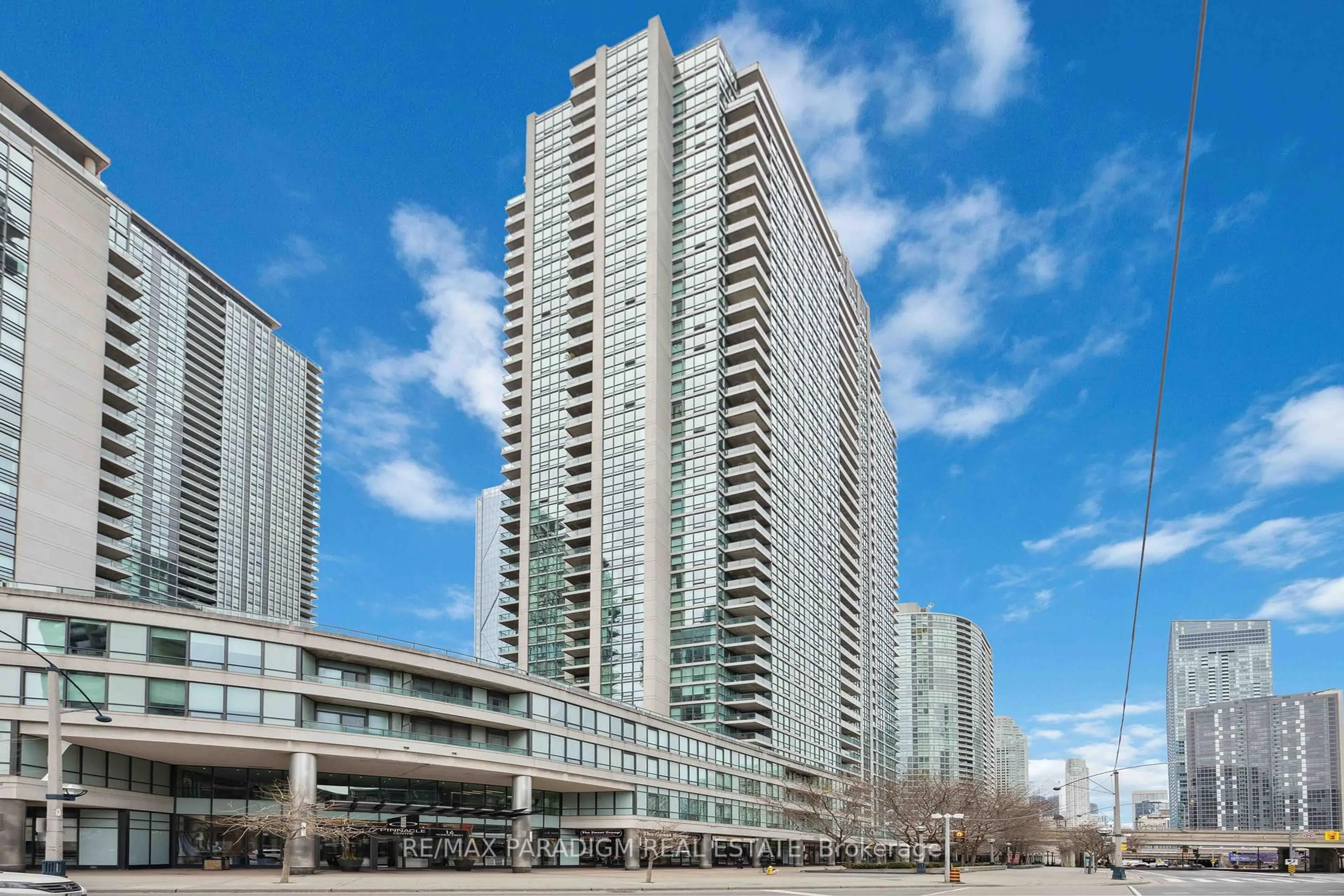 Patio, city buildings view from balcony for 16 Yonge St #1713, Toronto Ontario M5E 2A1
