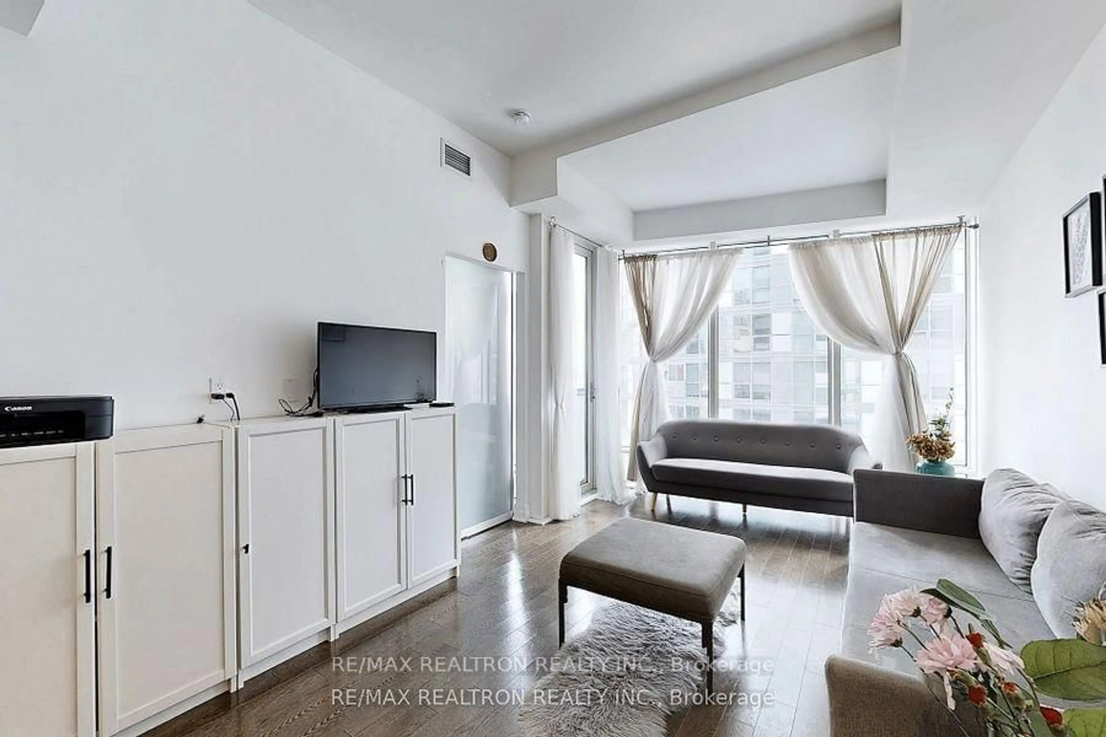 Living room with furniture, unknown for 8 The Esplanade St #1111, Toronto Ontario M5E 0A6