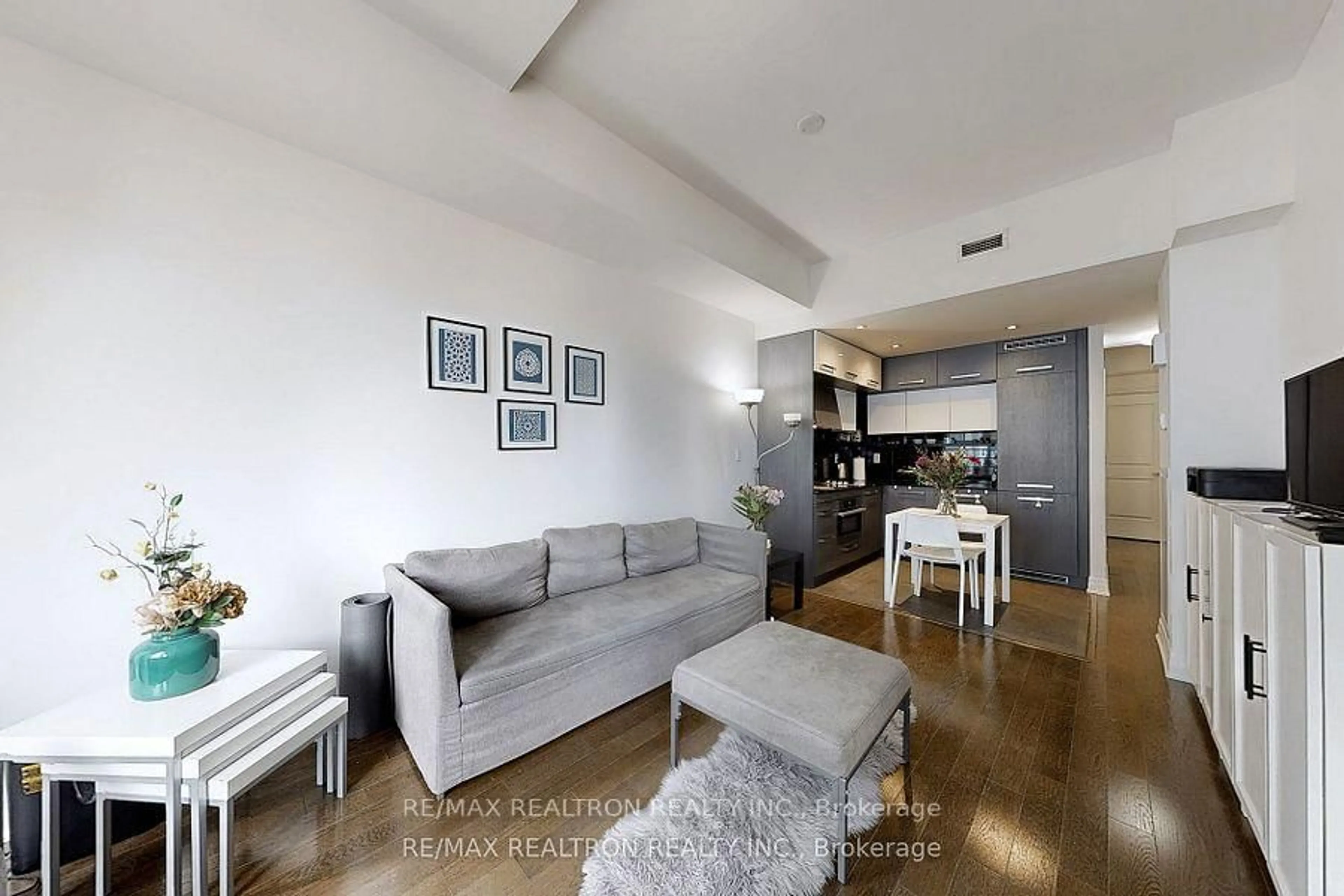 Living room with furniture, unknown for 8 The Esplanade St #1111, Toronto Ontario M5E 0A6
