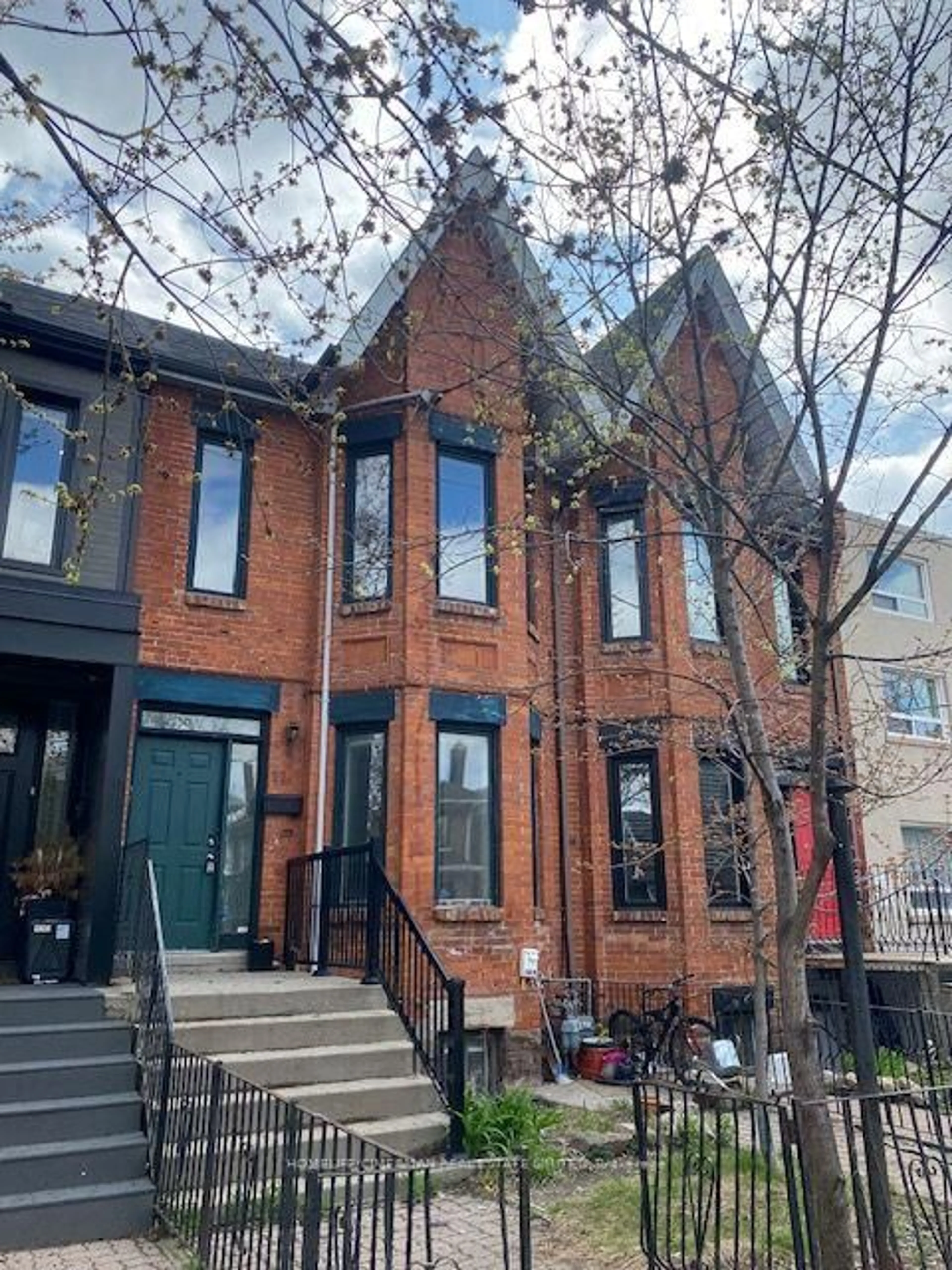 Home with brick exterior material, street for 27 Rusholme Rd, Toronto Ontario M6J 3H3