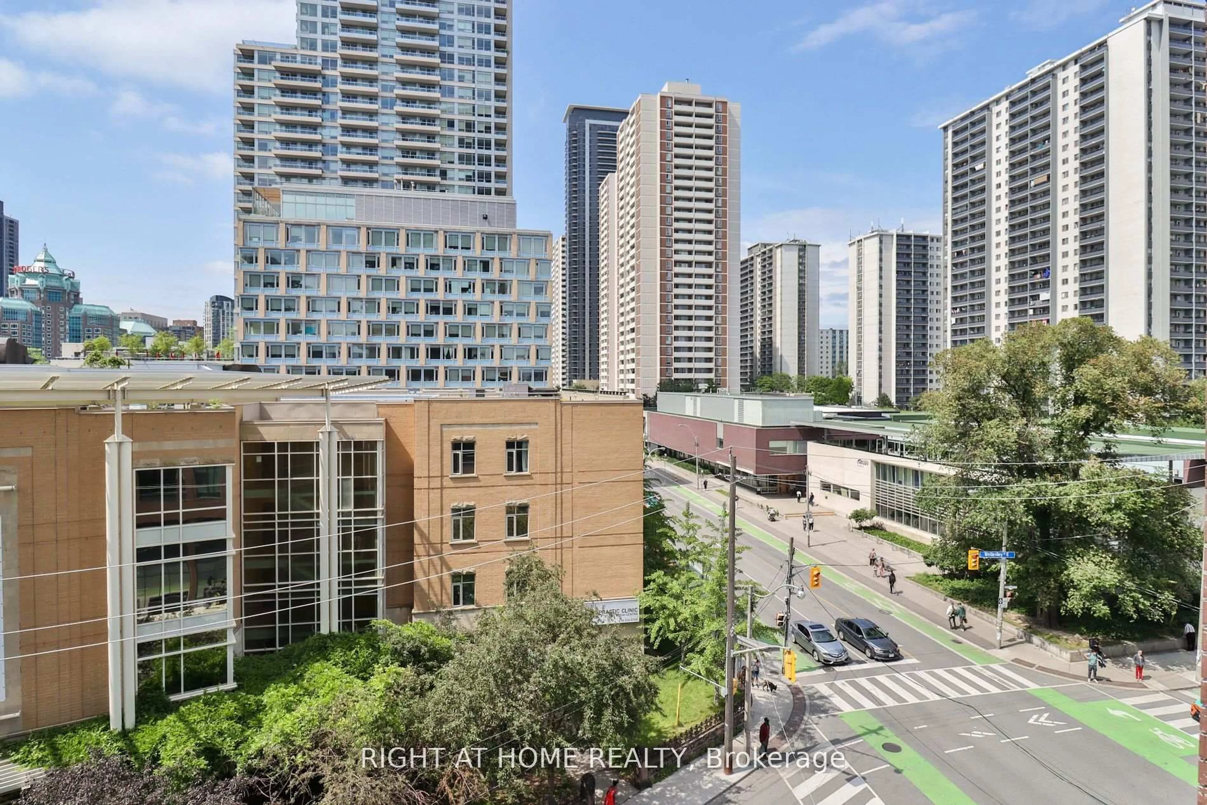 A pic from outside/outdoor area/front of a property/back of a property/a pic from drone, city buildings view from balcony for 159 Wellesley St #6, Toronto Ontario M4Y 0H5