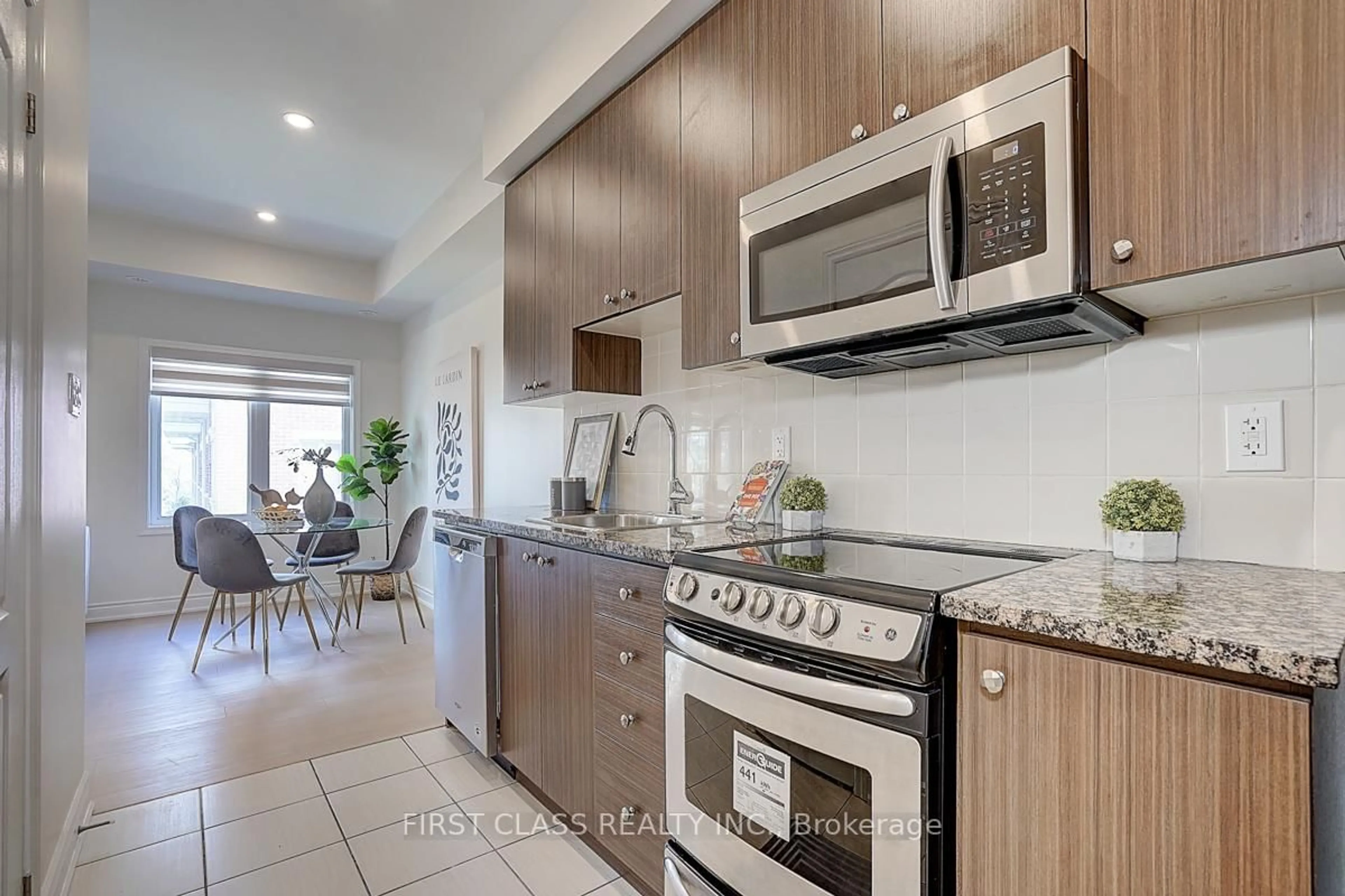 Open concept kitchen, unknown for 17 Coneflower Cres #220, Toronto Ontario M2R 0A5