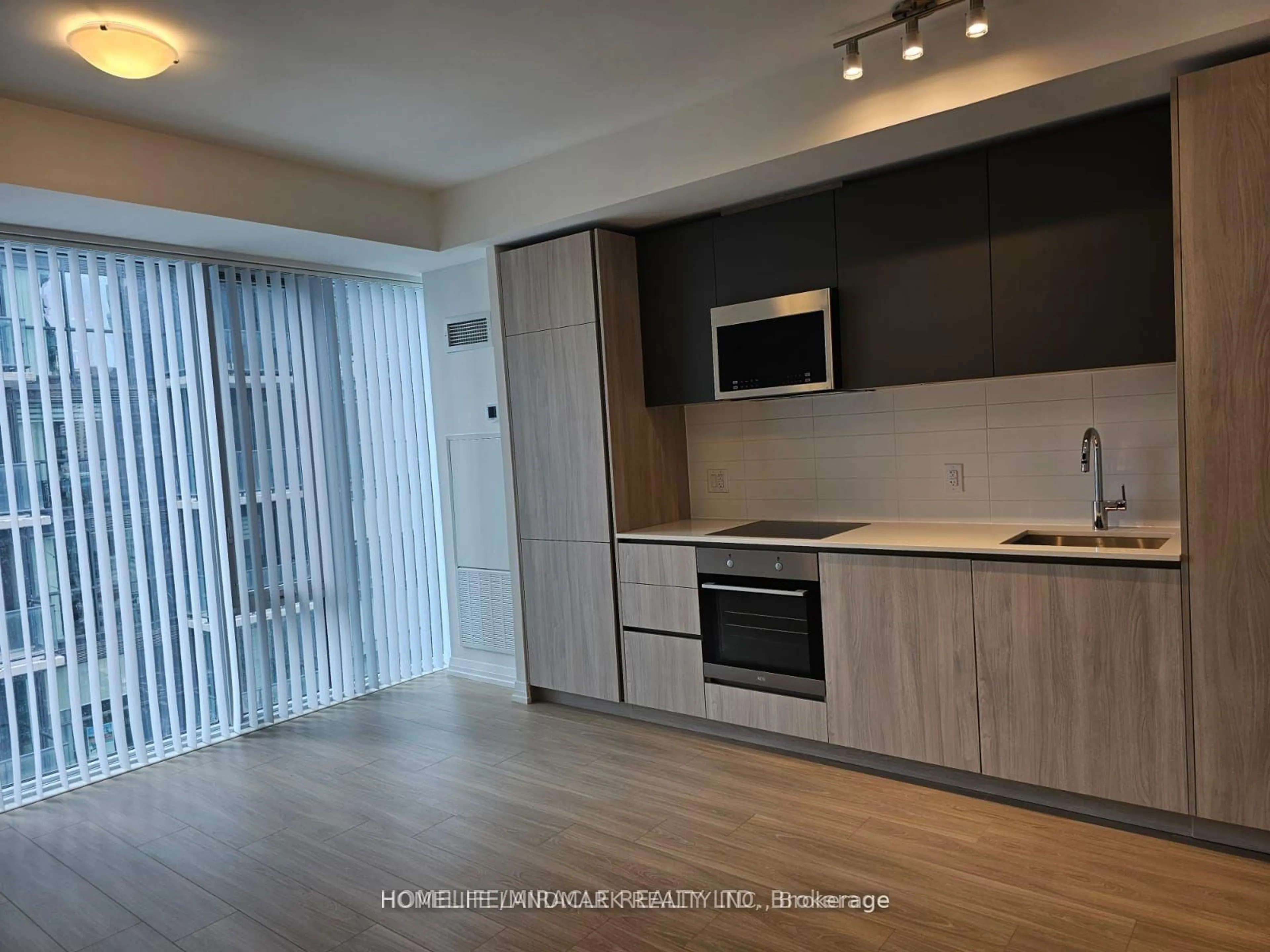 Standard kitchen, wood/laminate floor for 8 Widmer St #3501, Toronto Ontario M5V 2E7