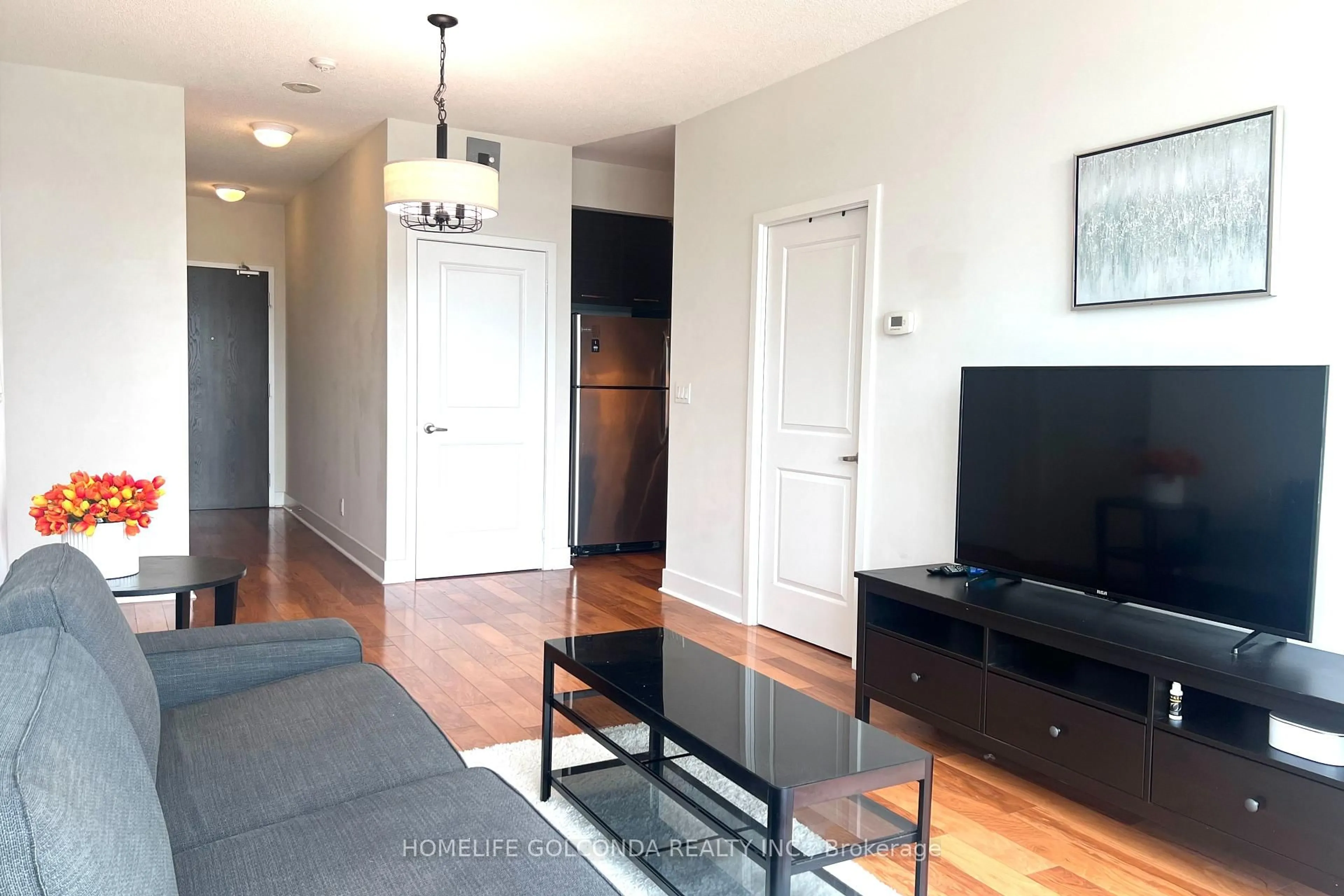 Living room with furniture, wood/laminate floor for 26 Norton Ave #801, Toronto Ontario M2N 0C6
