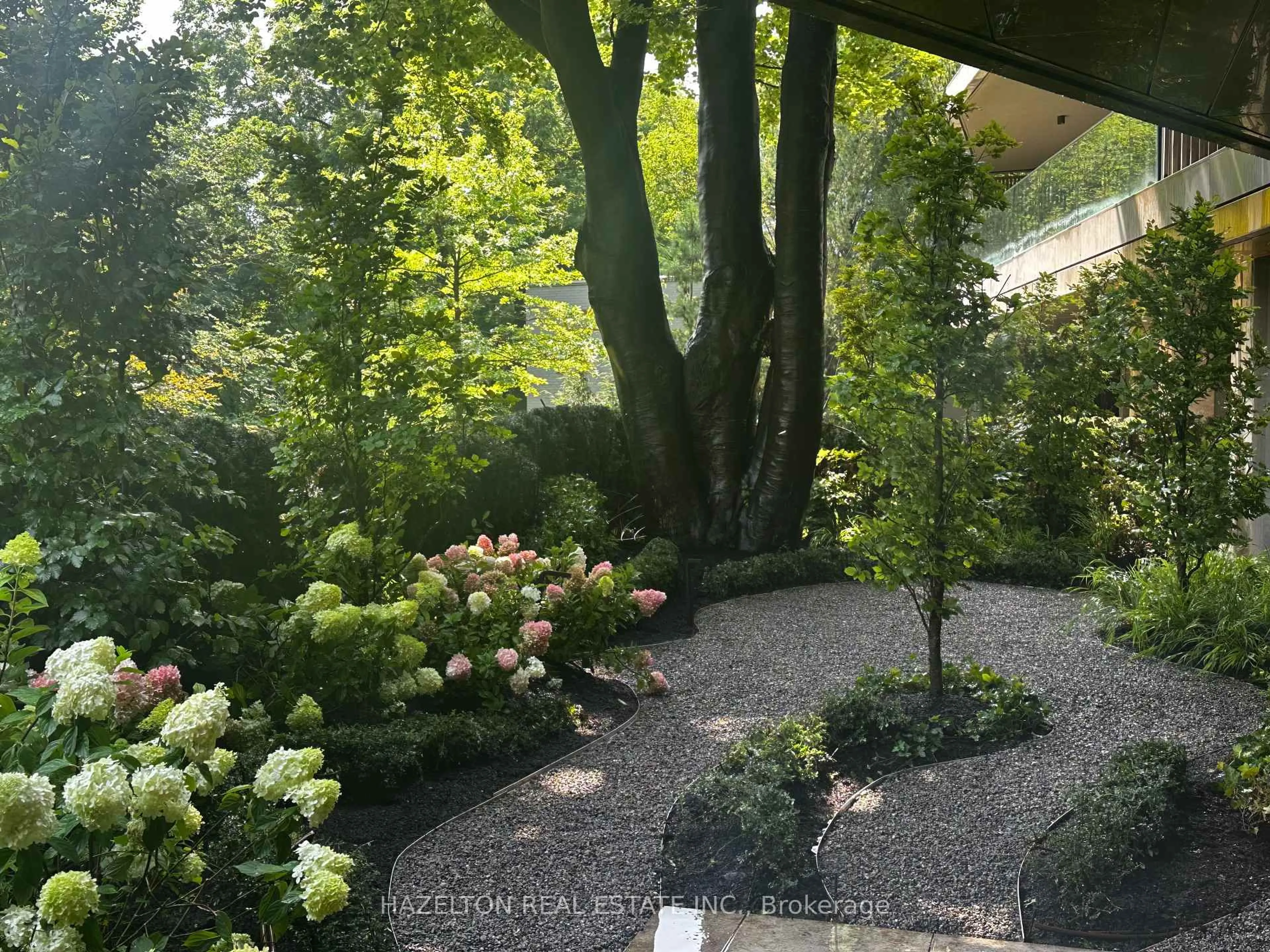 Patio, forest/trees view for 7 Dale Ave #104, Toronto Ontario M4W 1K2