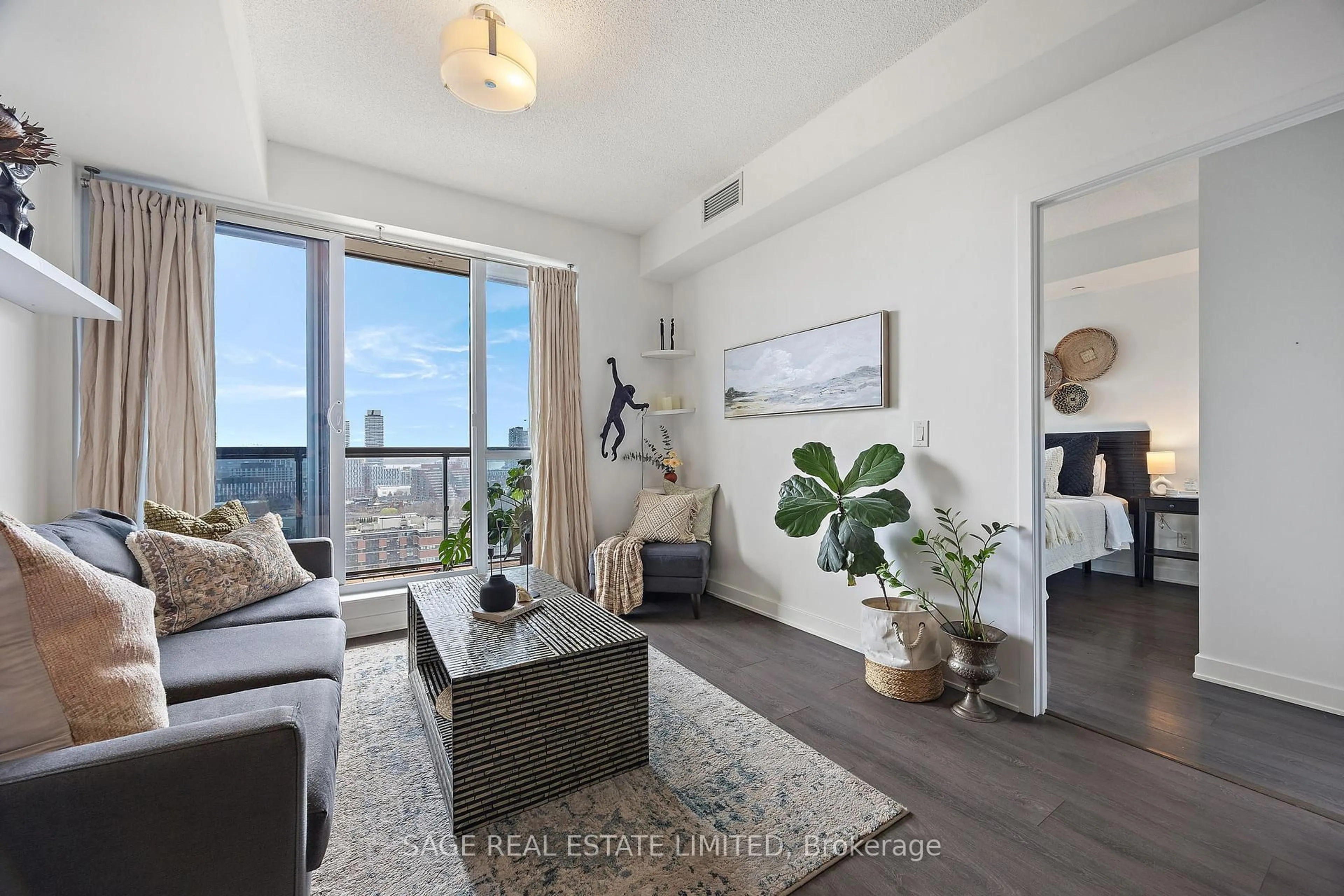 Living room with furniture, unknown for 55 Regent Park Blvd #1904, Toronto Ontario M5A 0C2