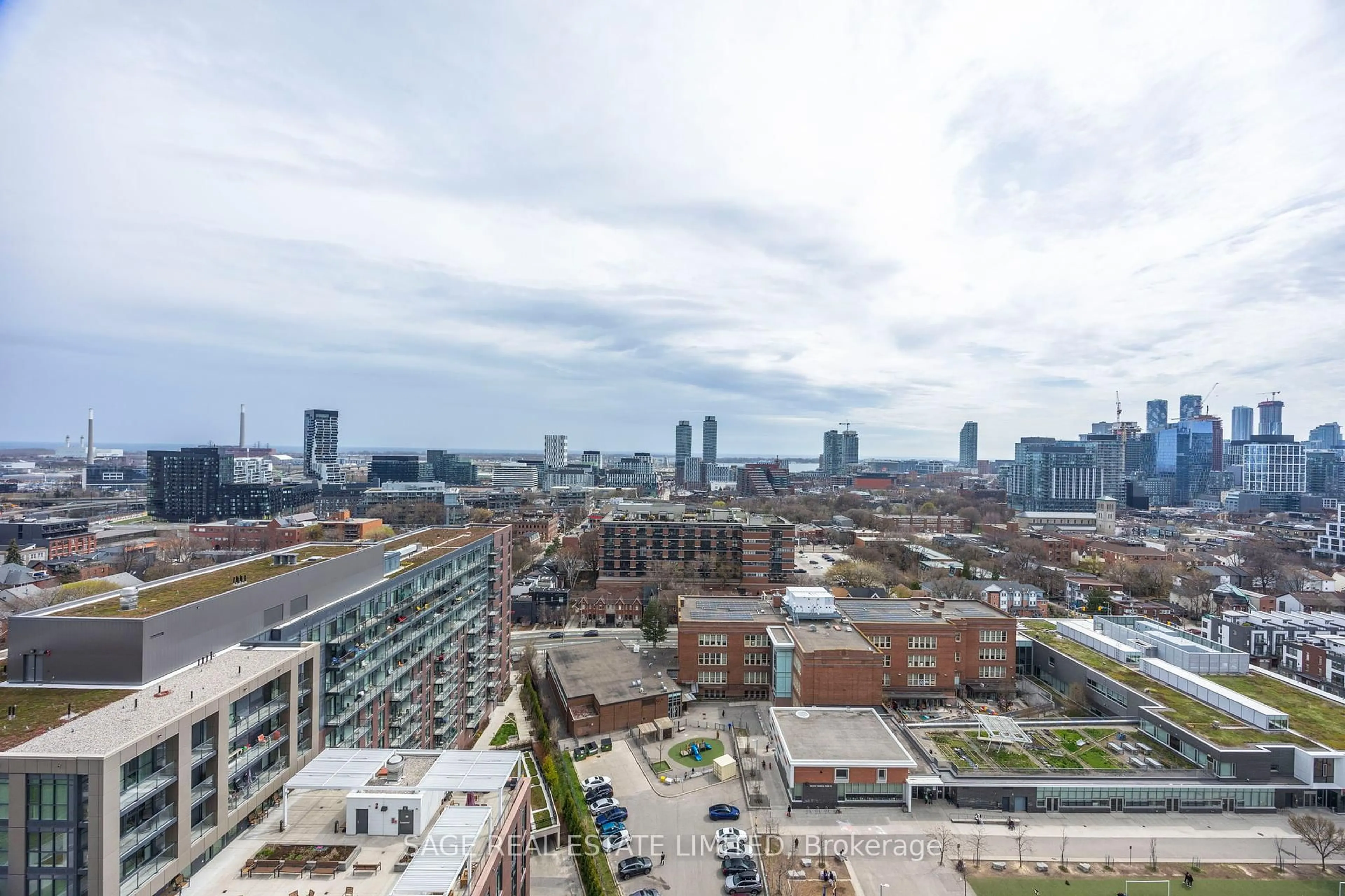 A pic from outside/outdoor area/front of a property/back of a property/a pic from drone, city buildings view from balcony for 55 Regent Park Blvd #1904, Toronto Ontario M5A 0C2