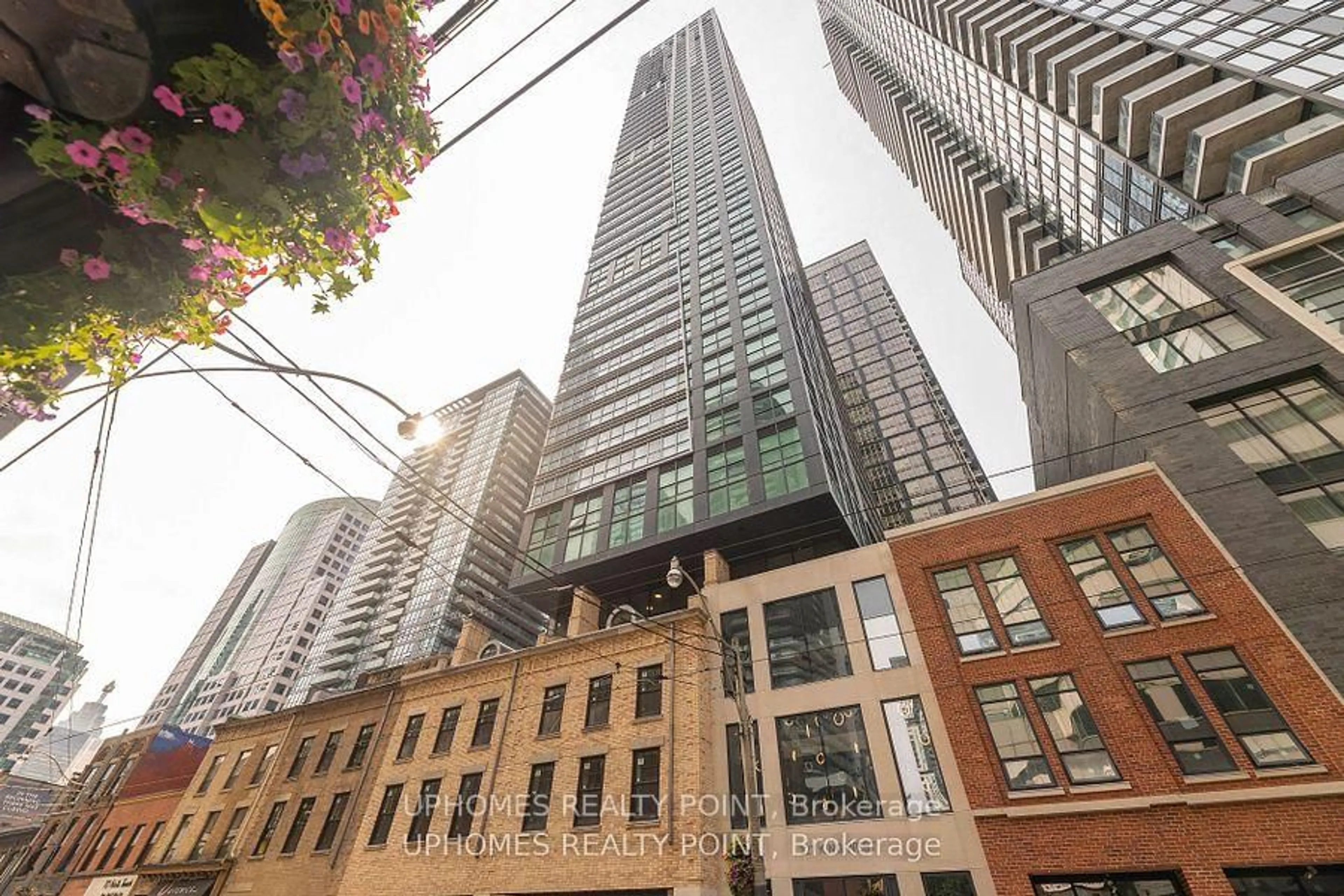 Patio, city buildings view from balcony for 327 King St #3205, Toronto Ontario M5V 0W7