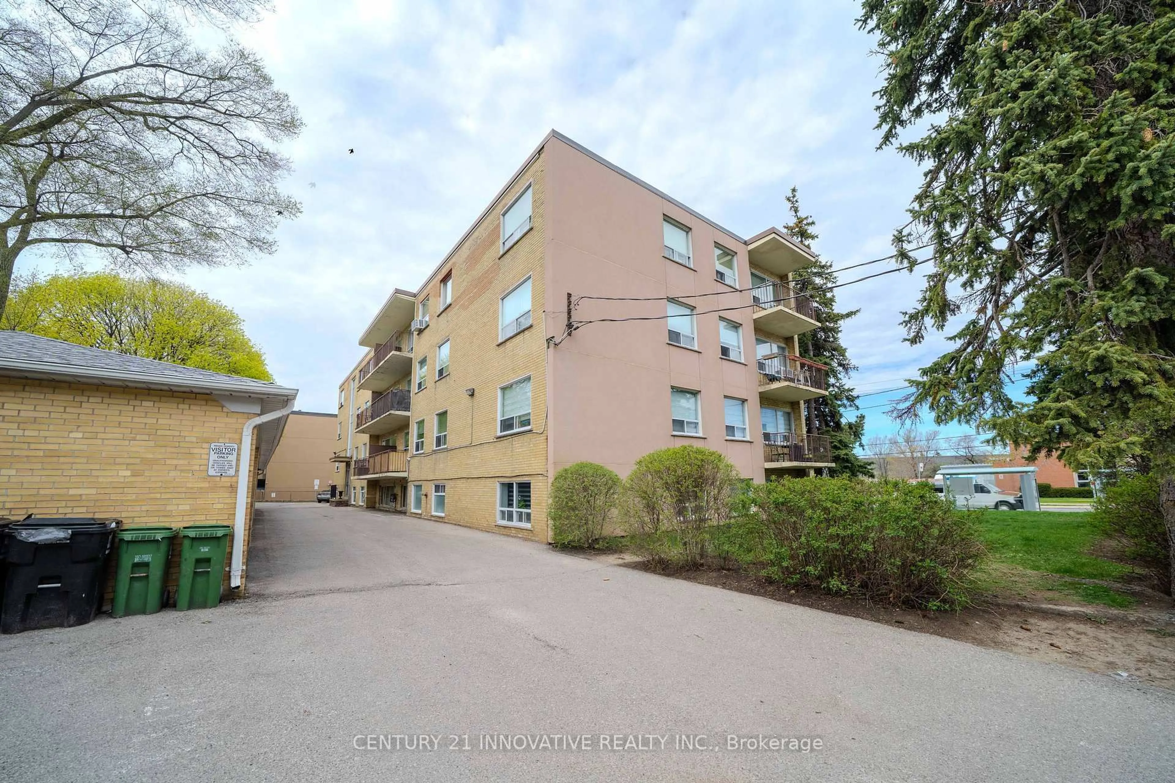 A pic from outside/outdoor area/front of a property/back of a property/a pic from drone, unknown for 219 Wilson Ave #101, Toronto Ontario M5M 3B2