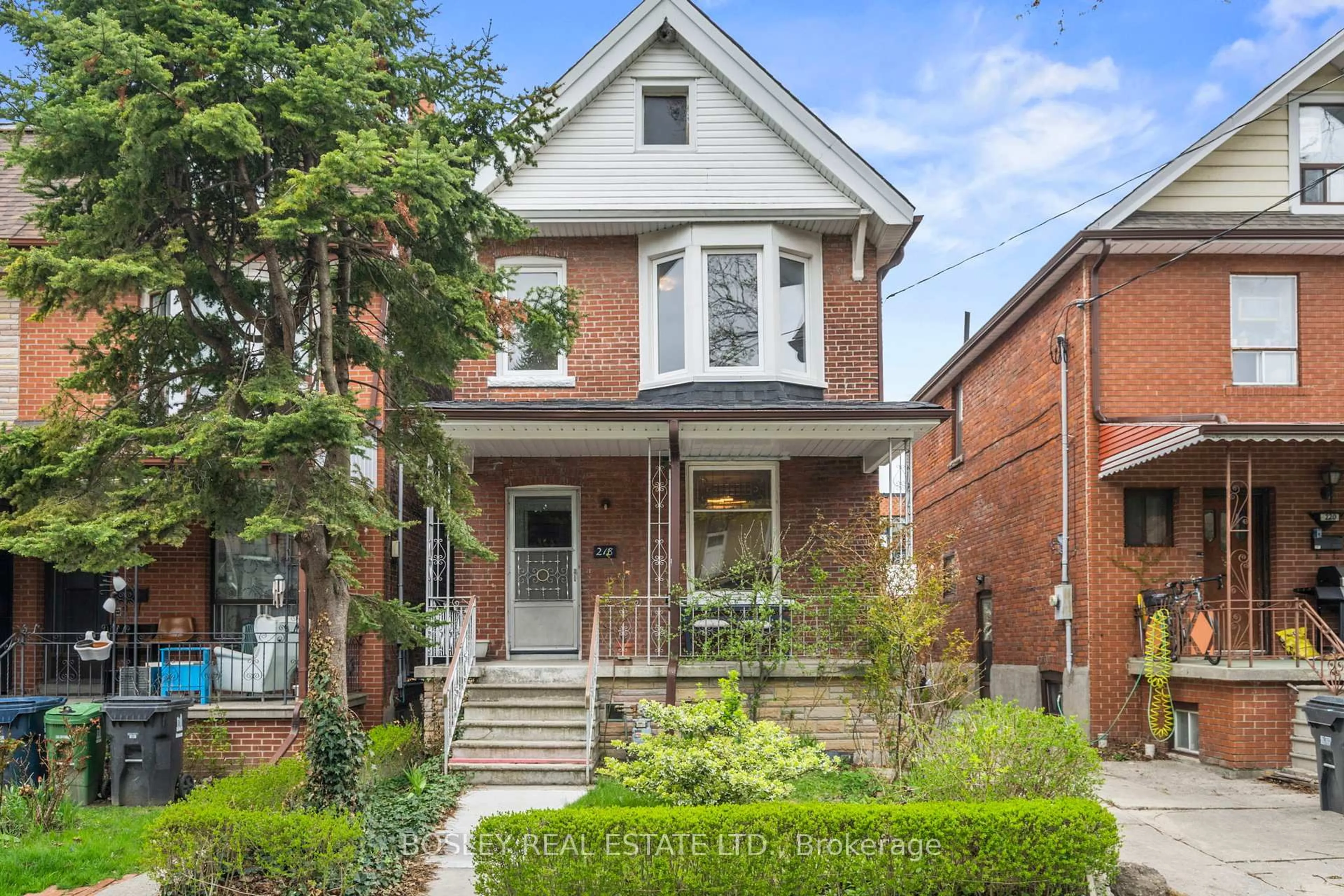 Home with brick exterior material, street for 218 Montrose Ave, Toronto Ontario M6G 3G7