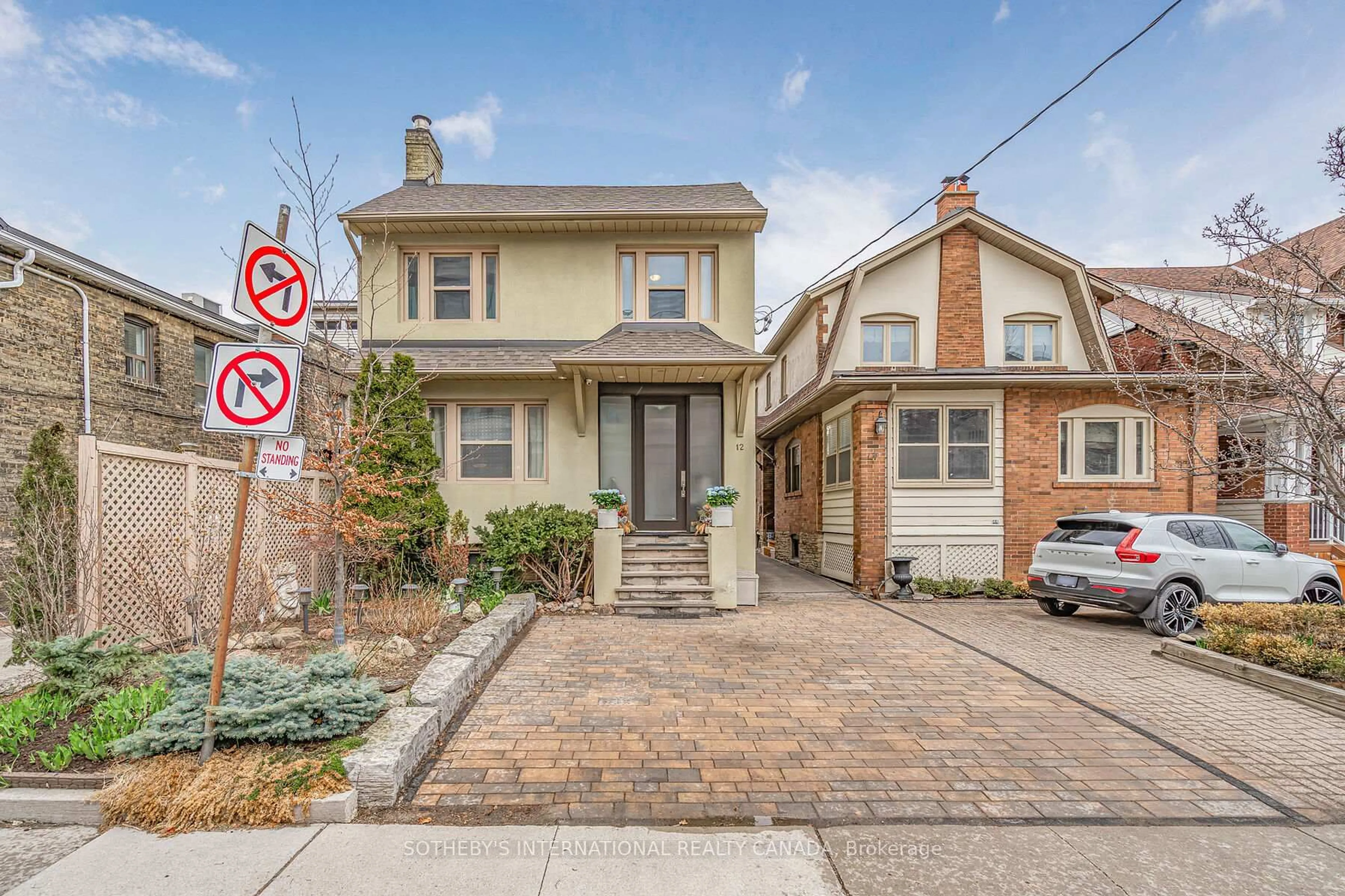 Home with brick exterior material, street for 12 Belsize Dr, Toronto Ontario M4S 1L4