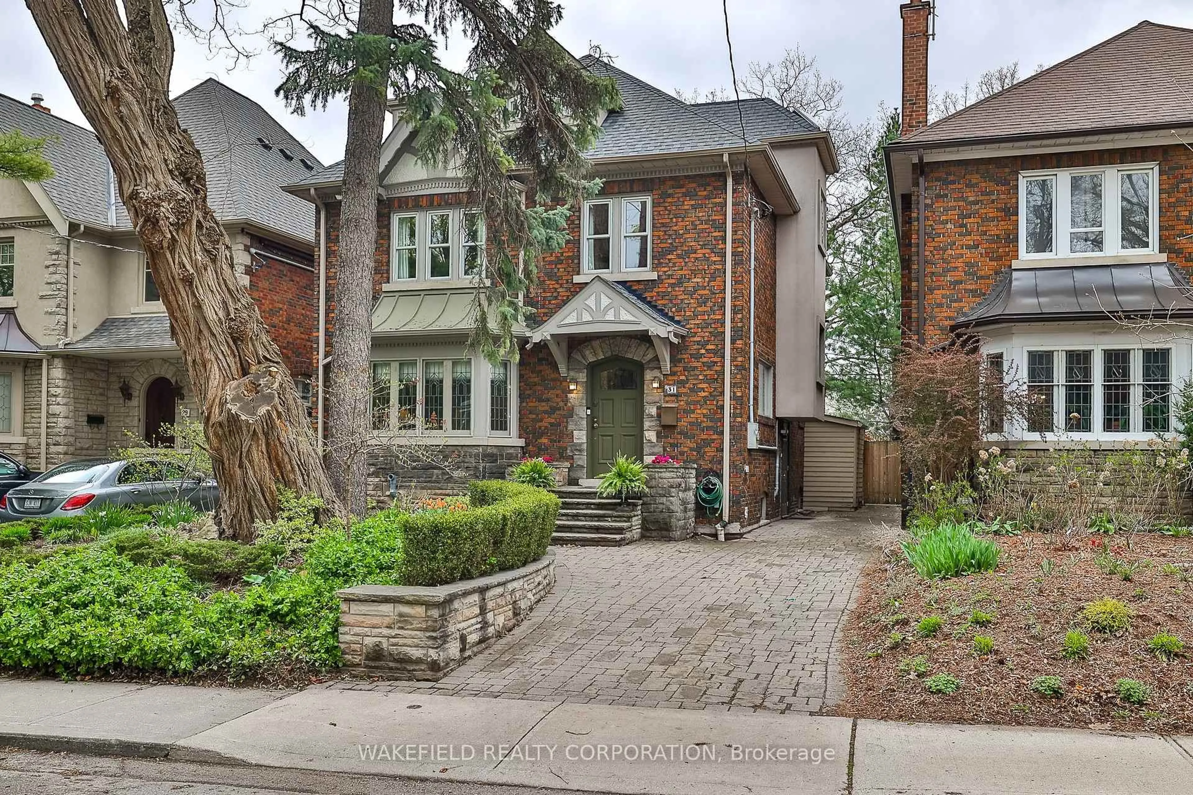 Home with brick exterior material, street for 31 Hillcrest Dr, Toronto Ontario M6G 2E2