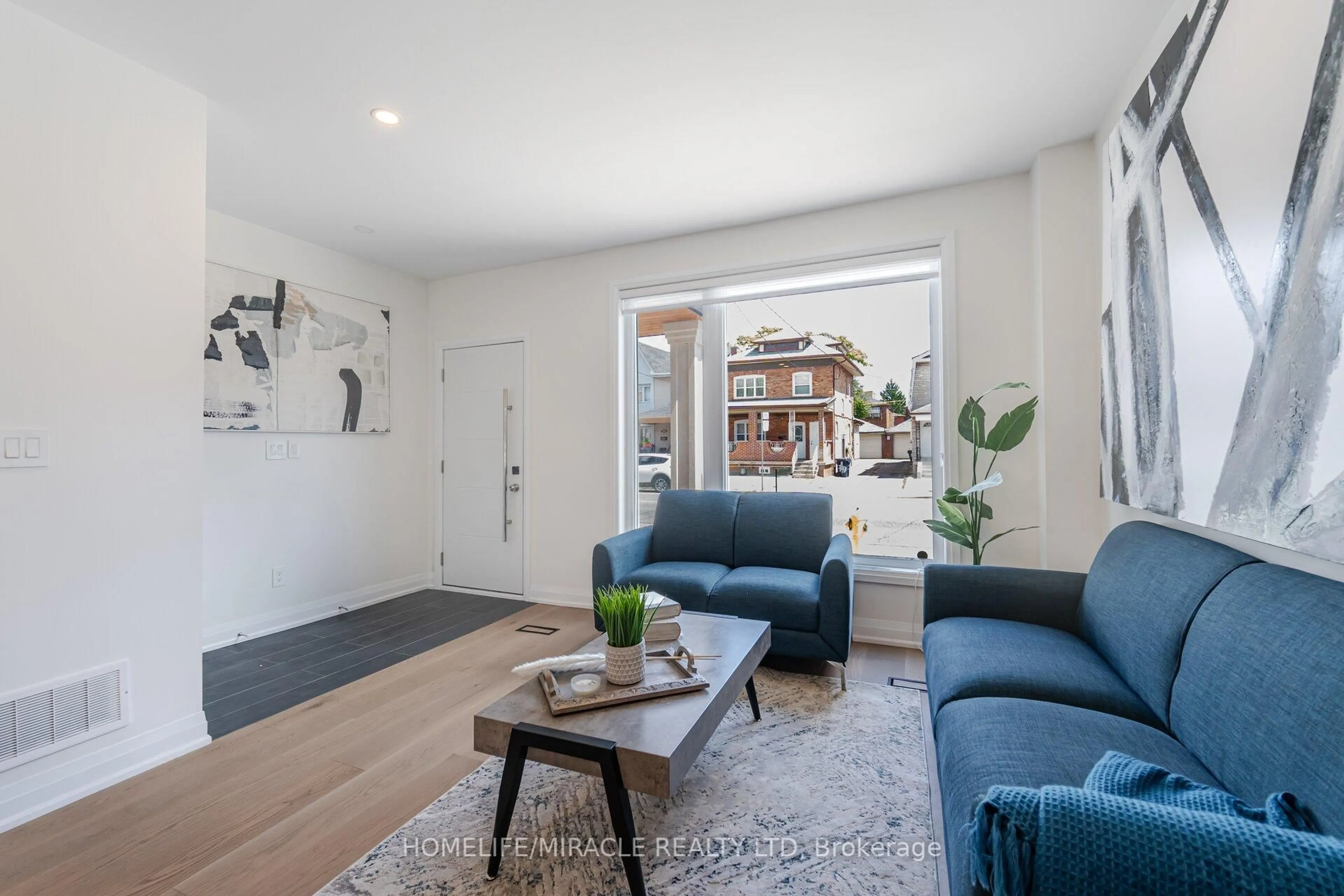 Living room with furniture, unknown for 388 Oakwood Ave, Toronto Ontario M6E 2W3