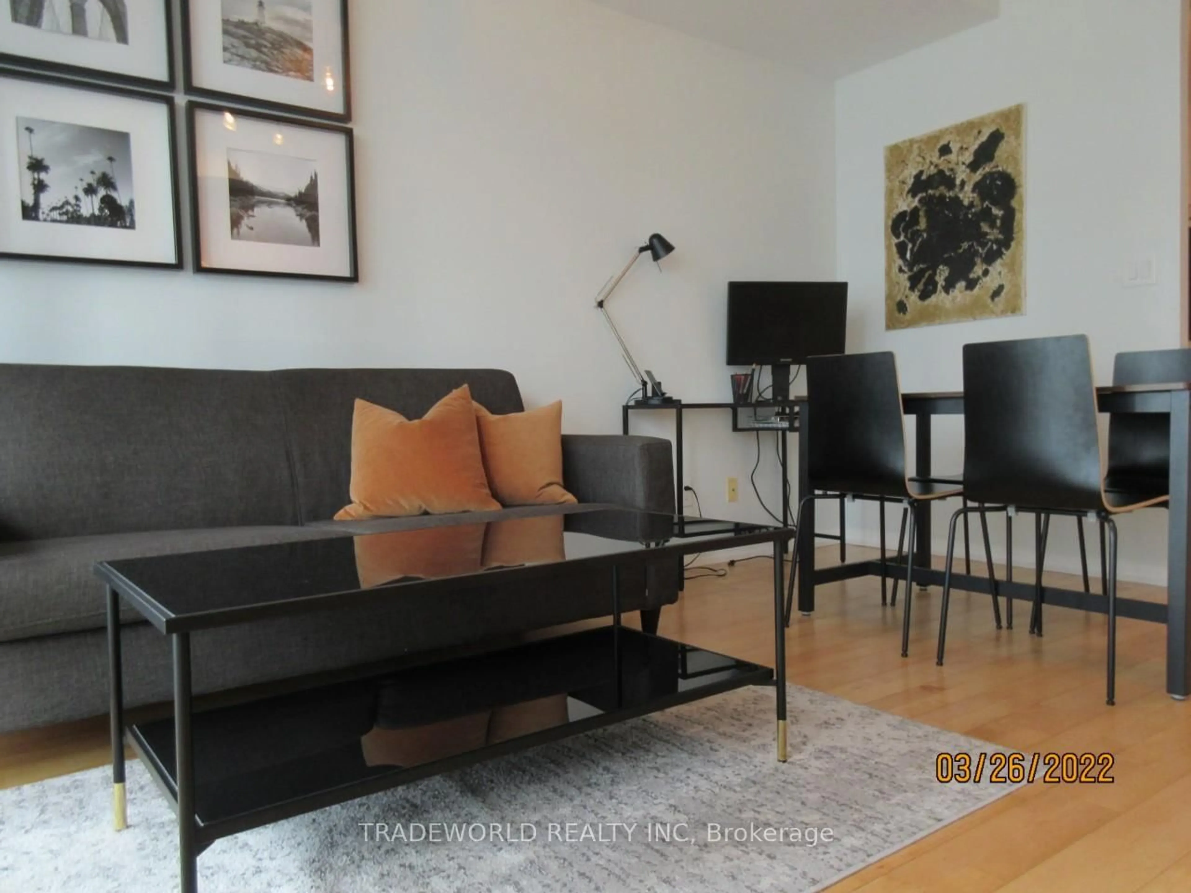 Living room with furniture, wood/laminate floor for 65 Bremner Blvd #1906, Toronto Ontario M5J 0A7