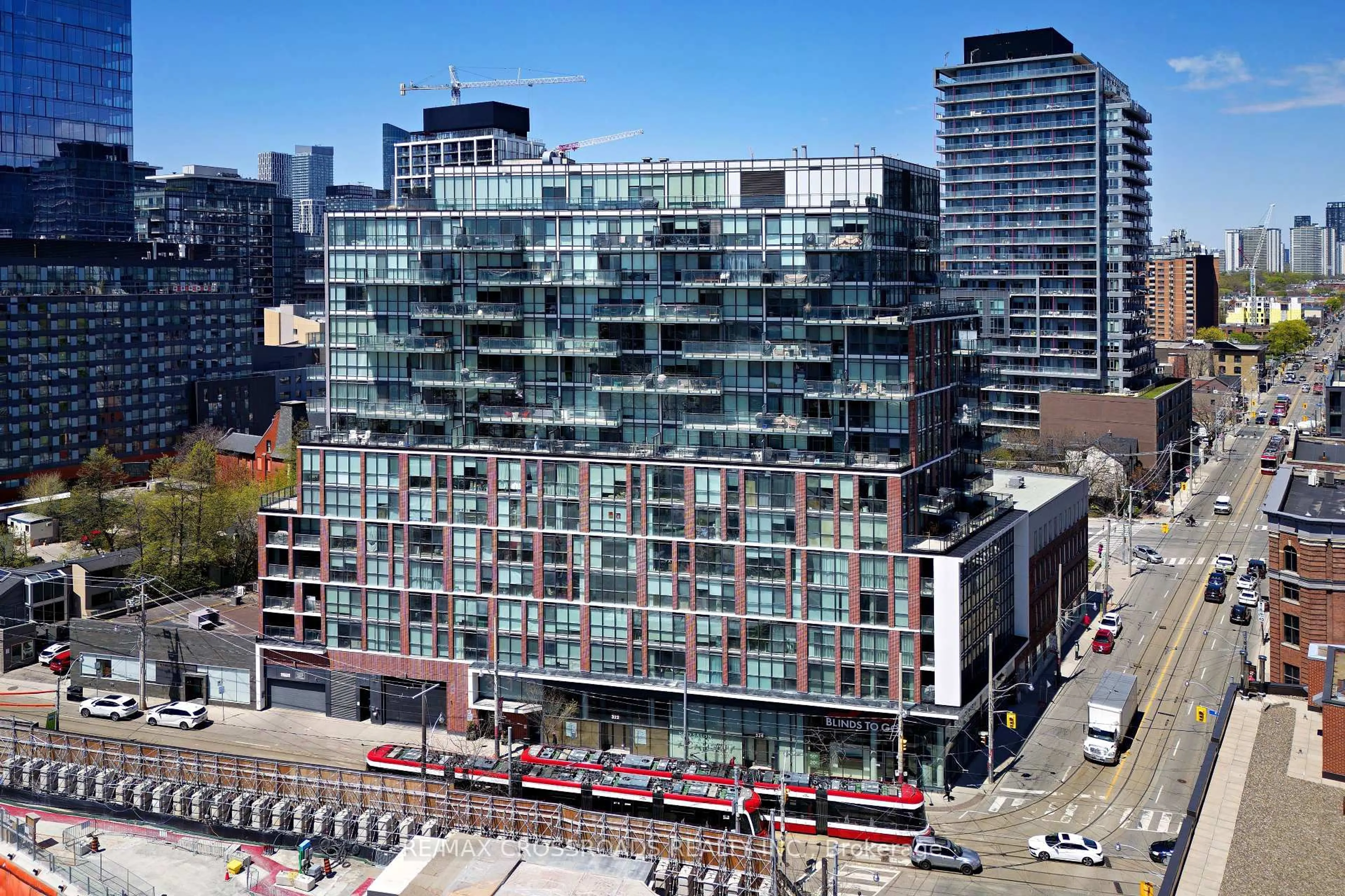 A pic from outside/outdoor area/front of a property/back of a property/a pic from drone, city buildings view from balcony for 318 King St #1310, Toronto Ontario M5A 0C1