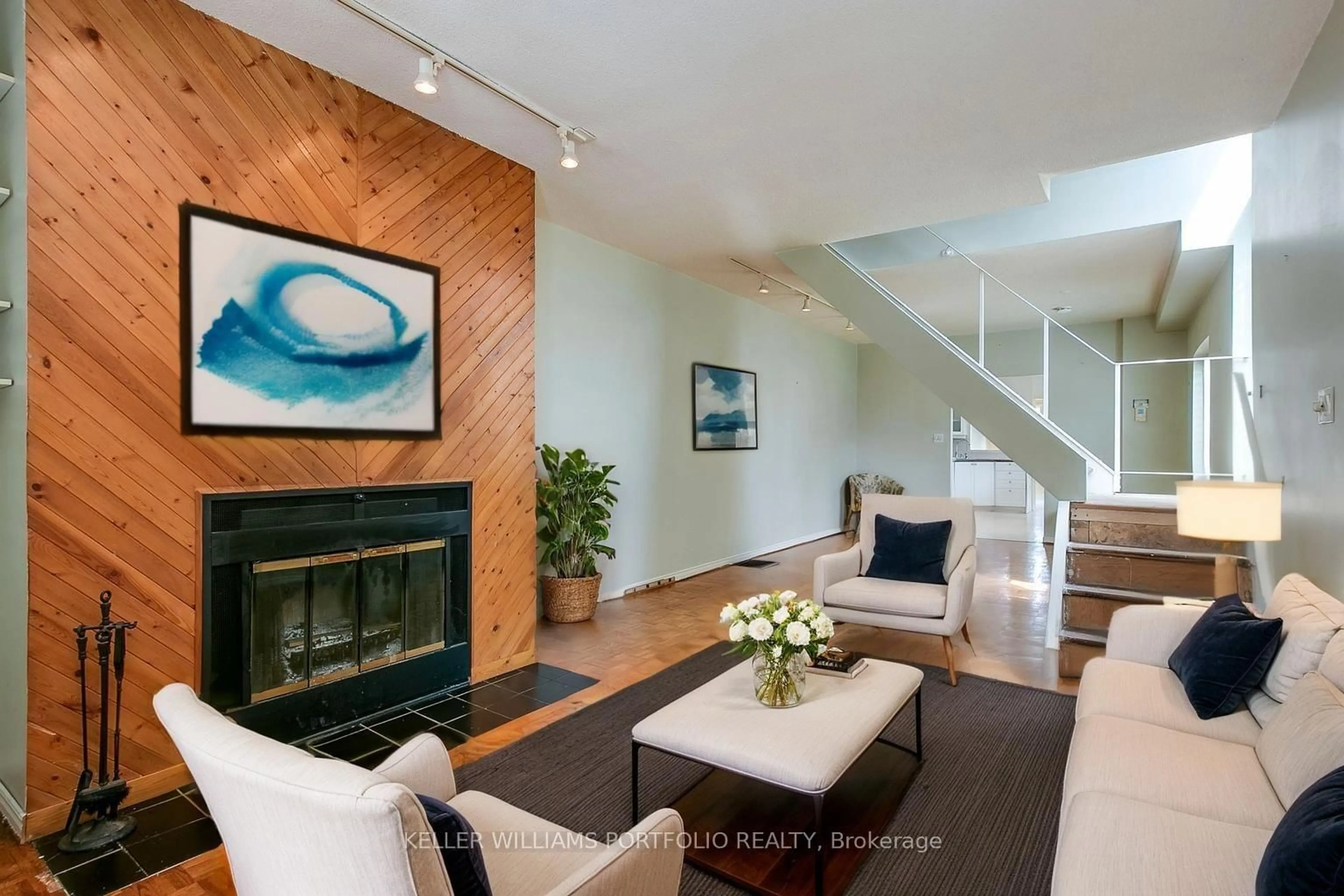 Living room with furniture, wood/laminate floor for 11 Arlington Ave, Toronto Ontario M6G 3K7