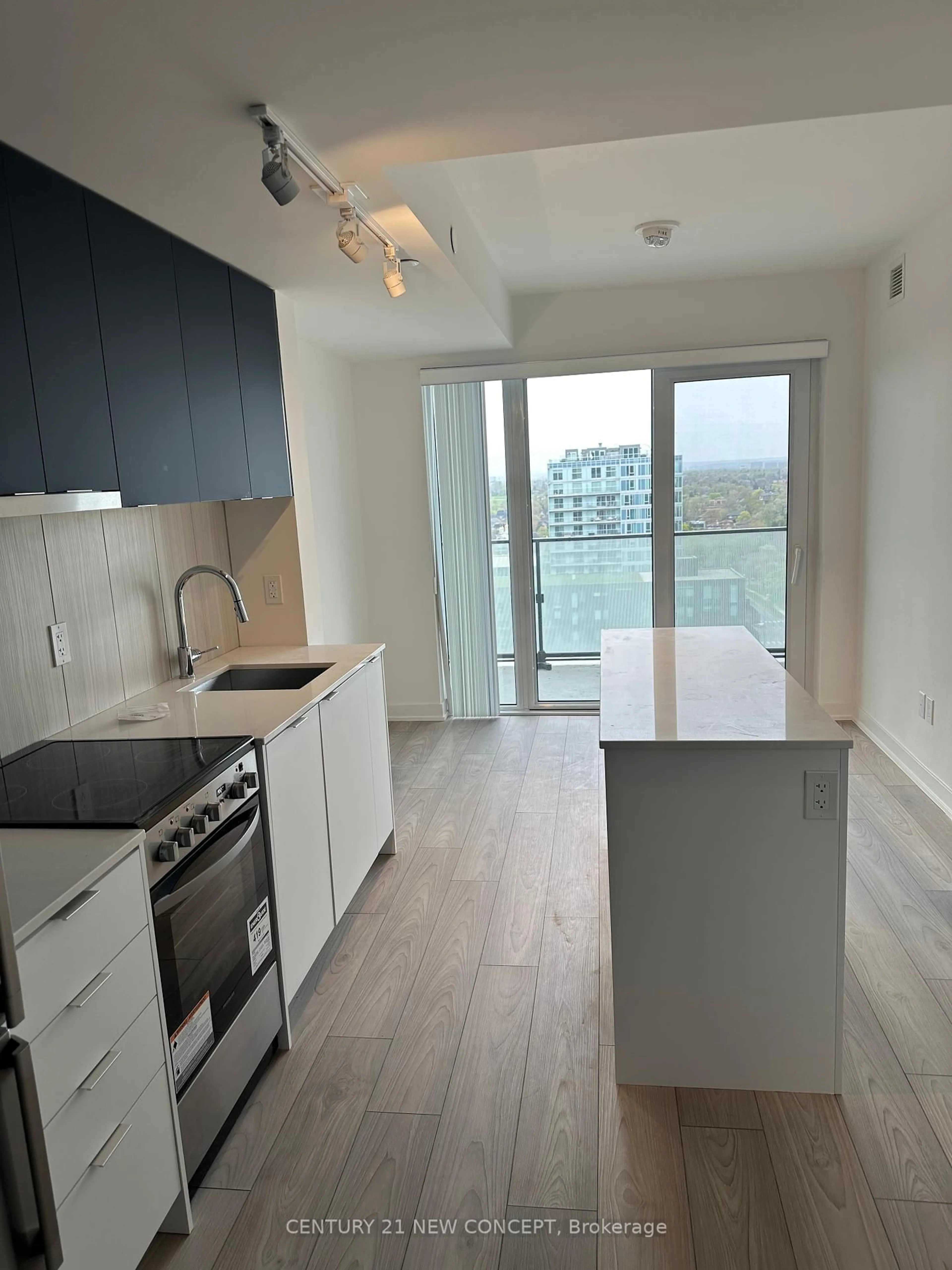 Standard kitchen, wood/laminate floor for 8 Tippett Rd #1402, Toronto Ontario M3H 0E7