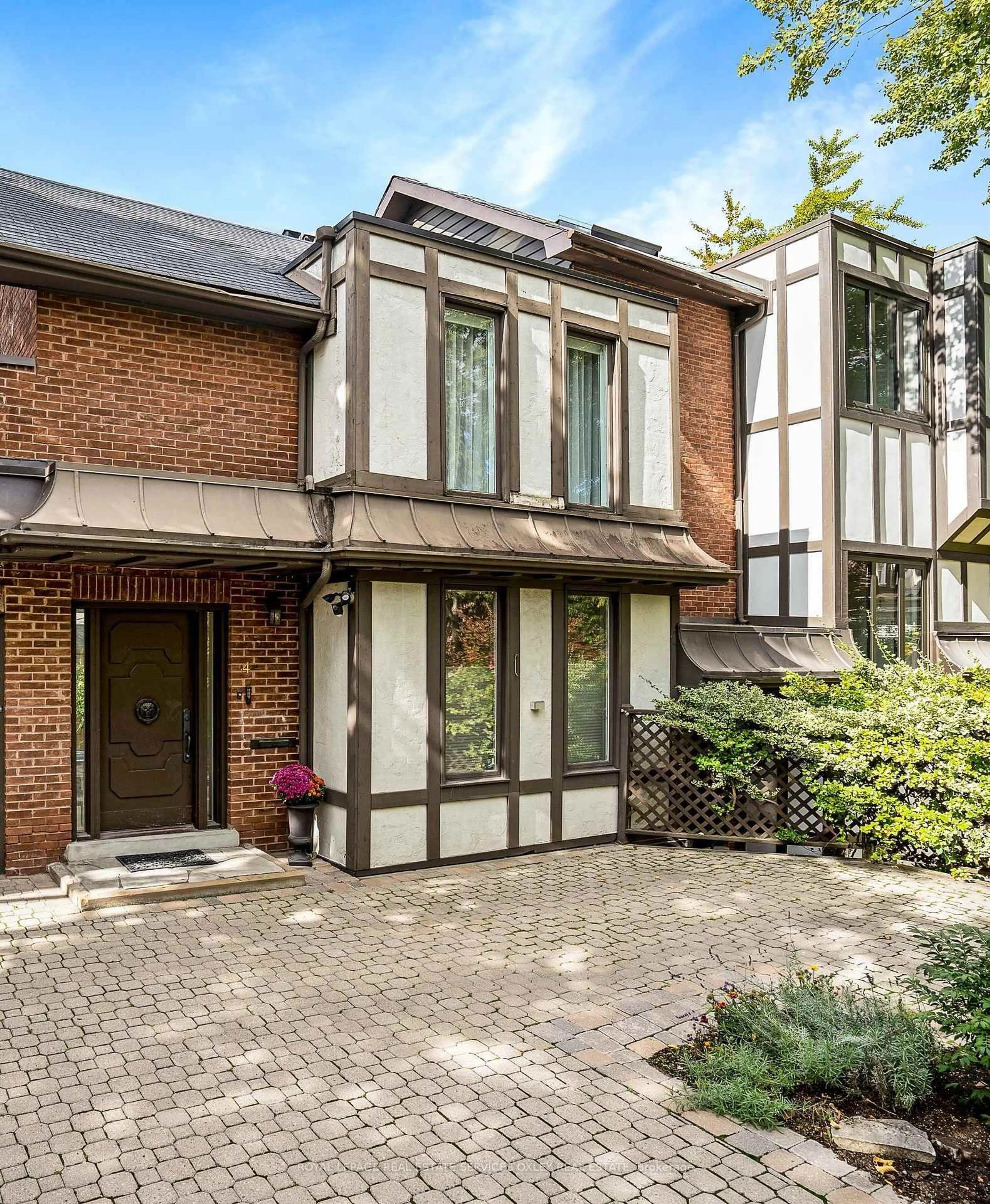 Home with brick exterior material, street for 58 Elm Ave #TH4, Toronto Ontario M4W 1N7