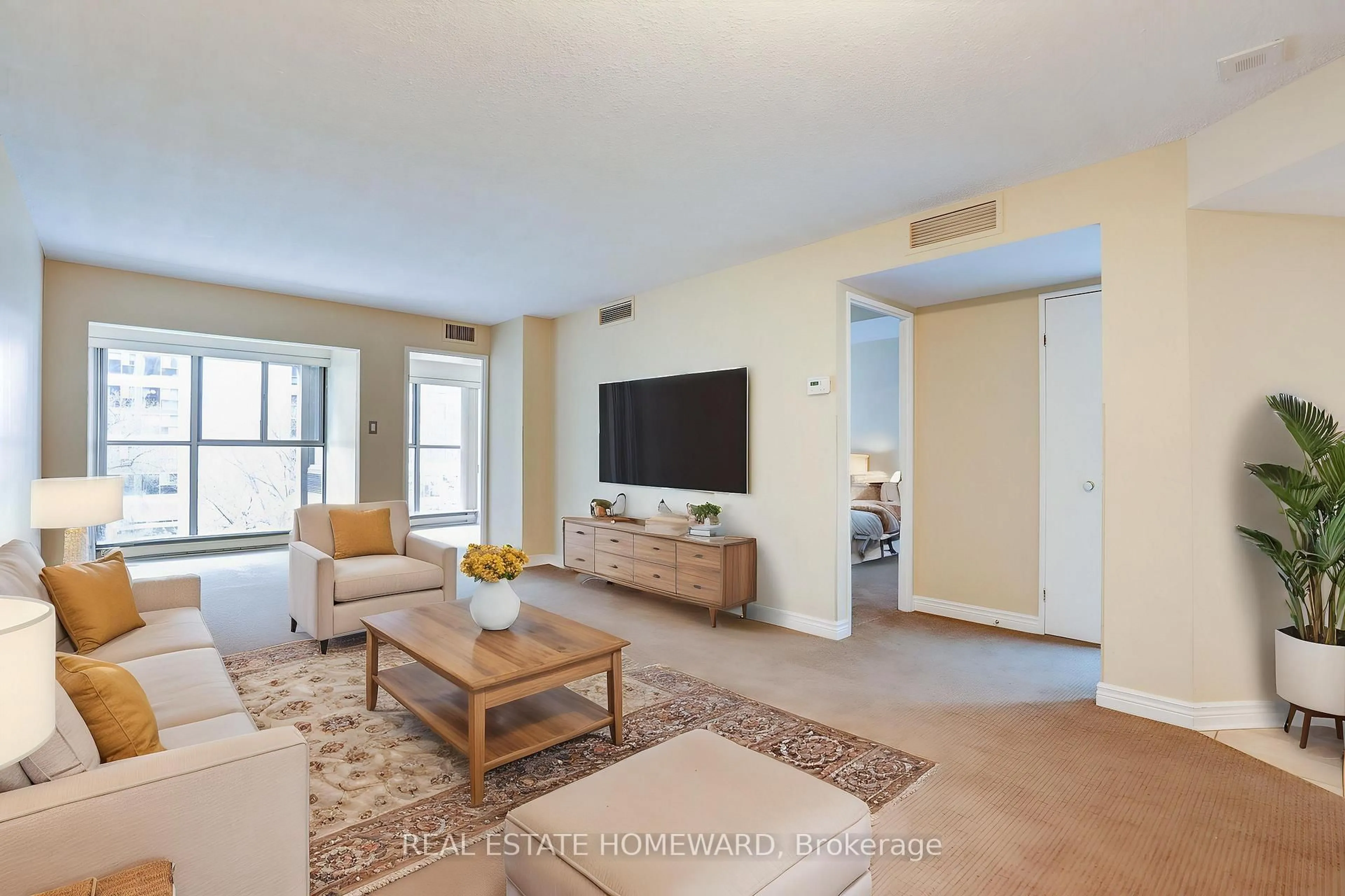 Living room with furniture, unknown for 65 Scadding Ave #411, Toronto Ontario M5A 4L1