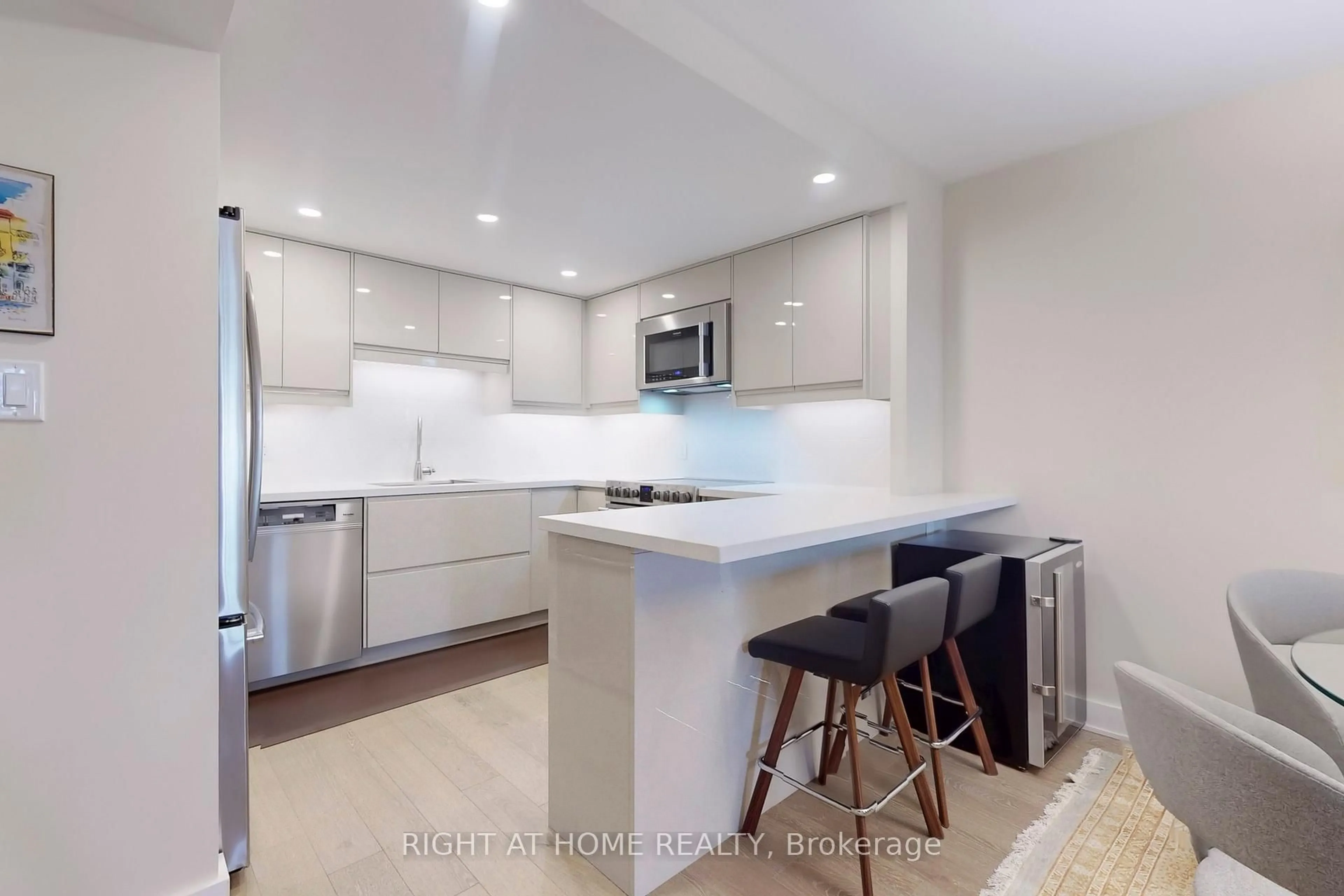 Open concept kitchen, ceramic/tile floor for 25 The Esplanade N/A #2316, Toronto Ontario M5E 1W5